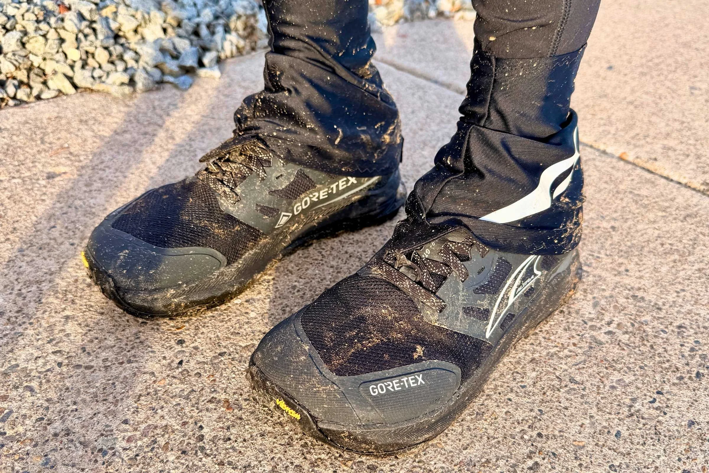   Altra Lone Peak 9 GORE-TEX trail running shoes with gaiters attached  