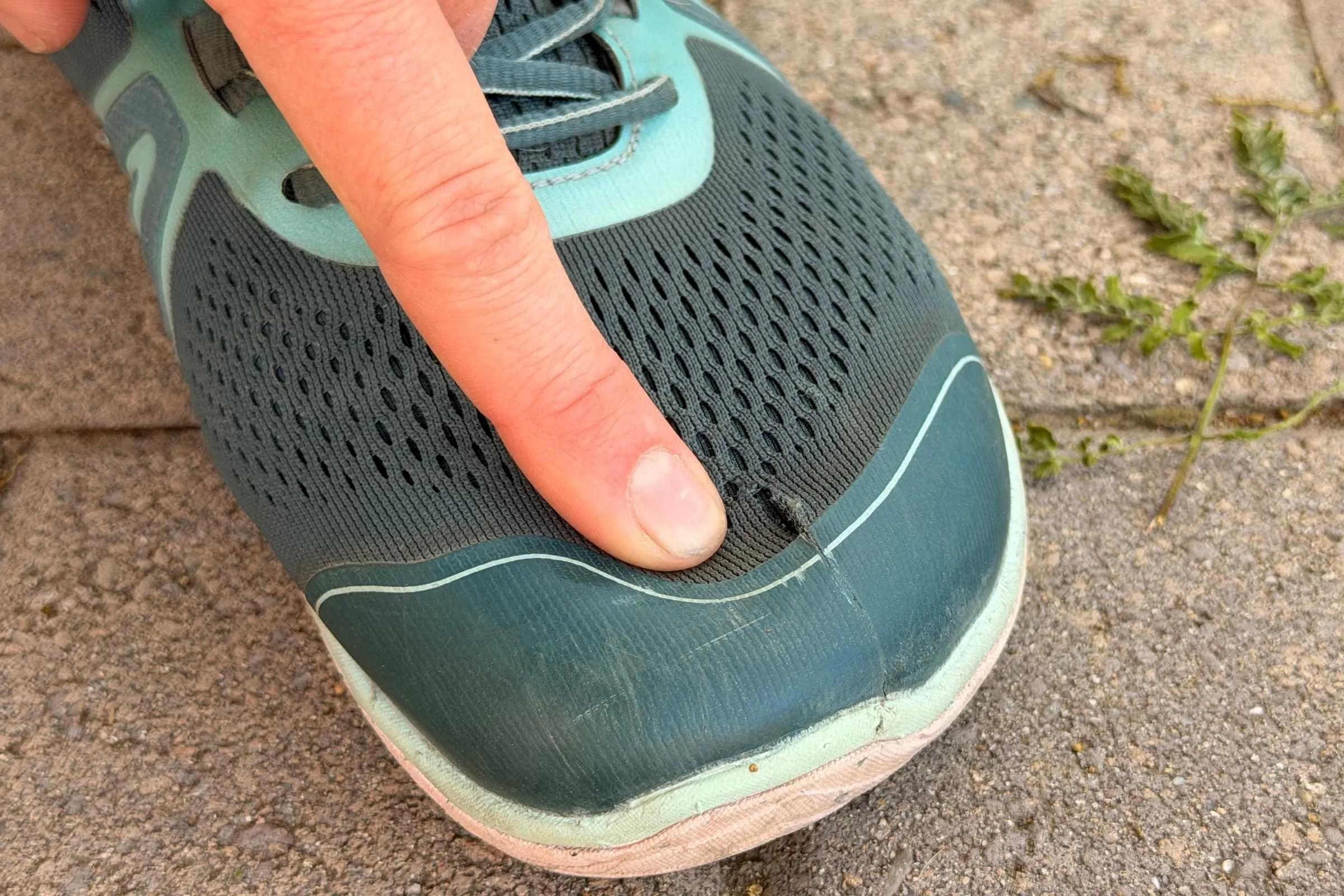   Close-up of Xero Shoes HFS II showing tear in the mesh on the toe box flexibility  