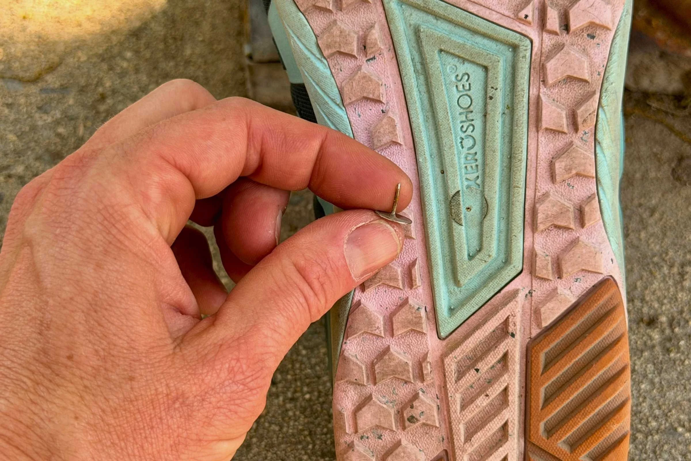   Pulling a tack out of the sole of Xero Shoes HFS II  