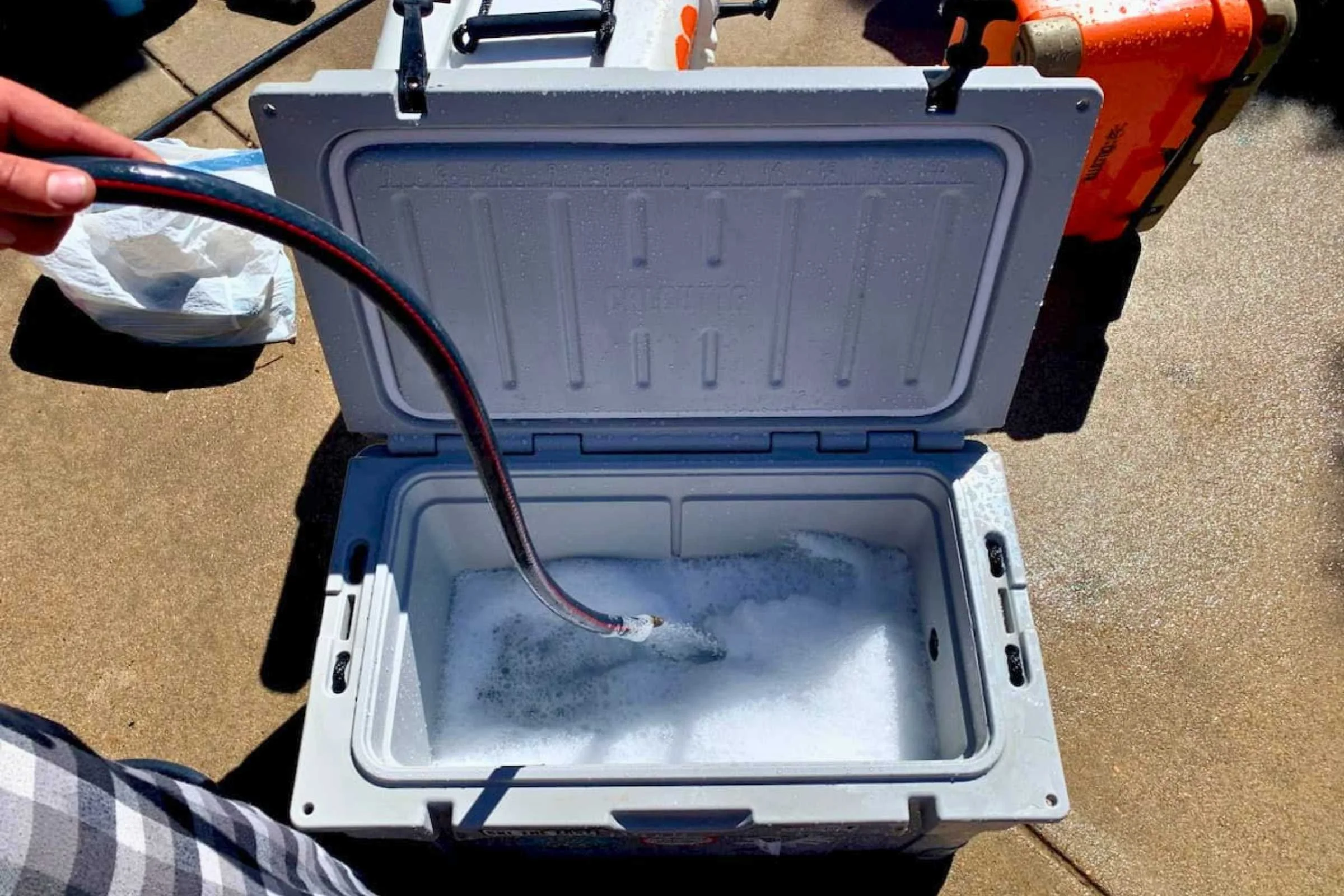   Cleaning out the 35 L Calcutta Renegade after 10 days on the river.   Photo courtesy Josette Deschambeault.  