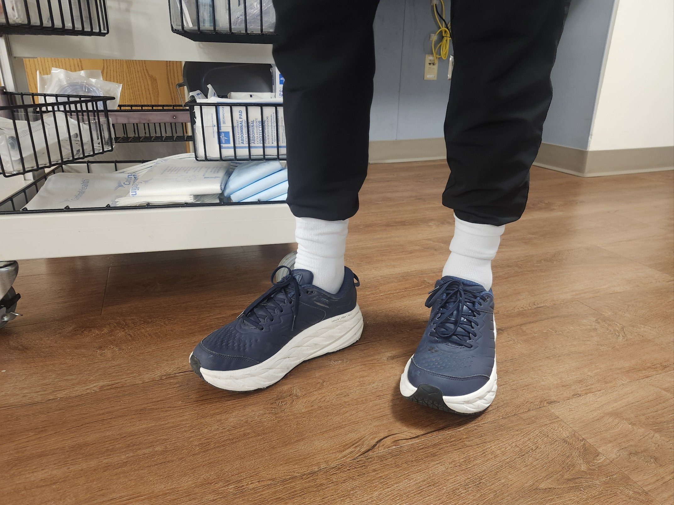  The HOKA Bondi SR walking shoes feature thick midsoles for all-day comfort and support.  