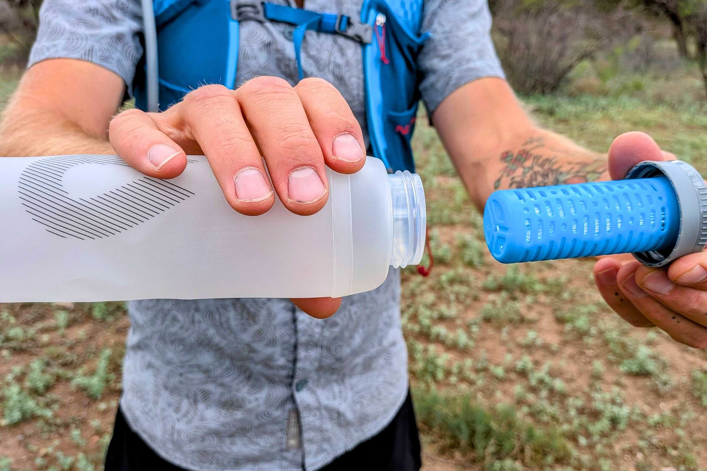   A close-up of the HydraPak UltraFlask+ and its removable filter cap.  