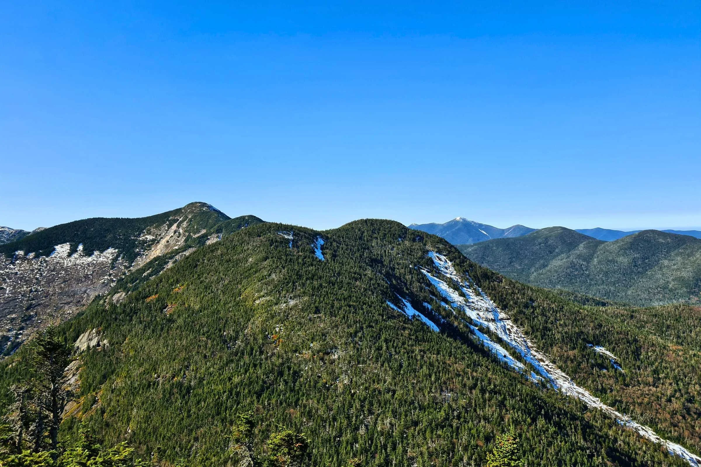   A view of Saddleback and Basin, with Marcy in the distance .  Photo by Aubri Drake.  
