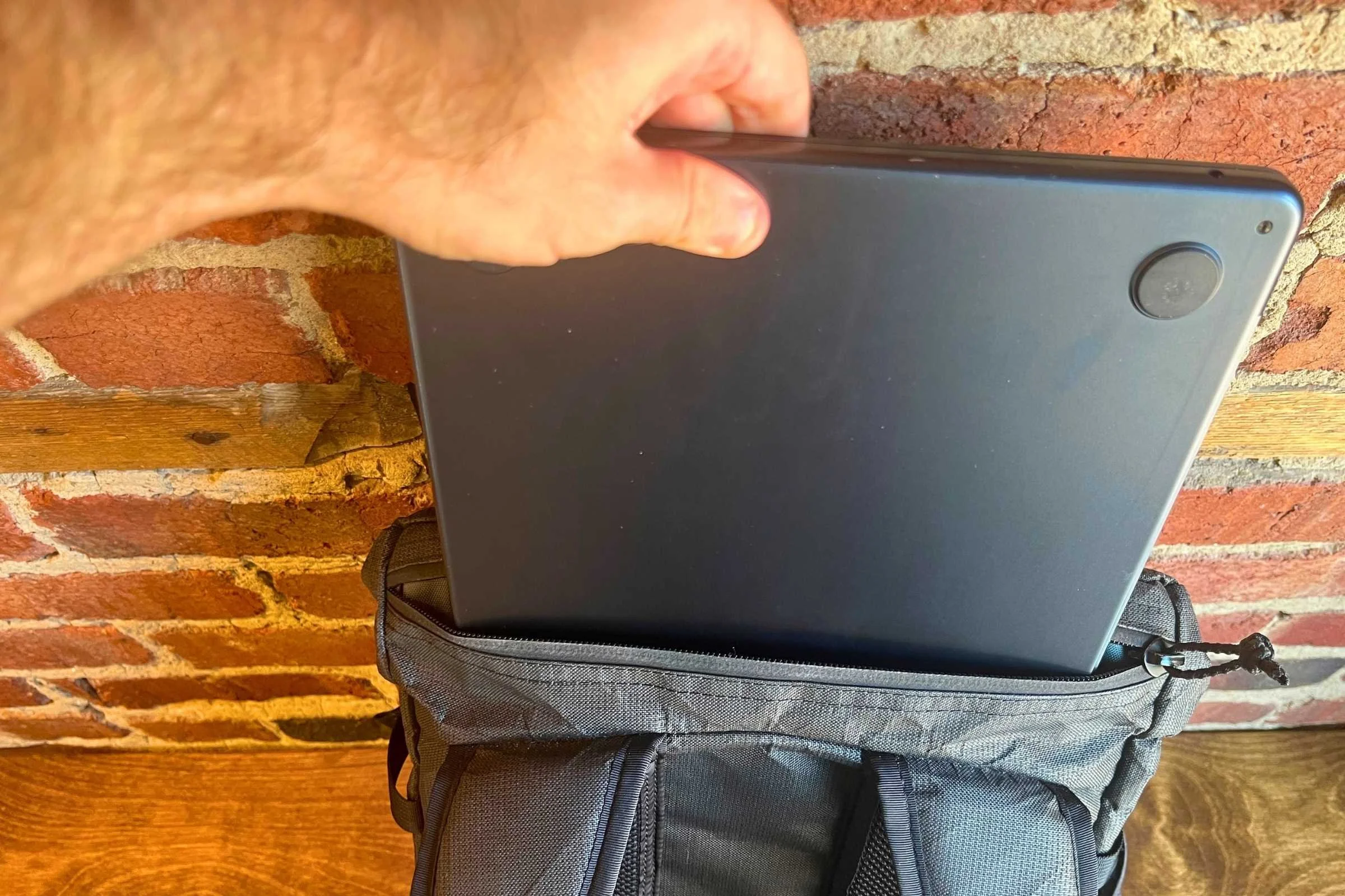   The ULA Ultra Dragonfly 30L has an external zippered laptop pocket for easy access to tech while traveling.  