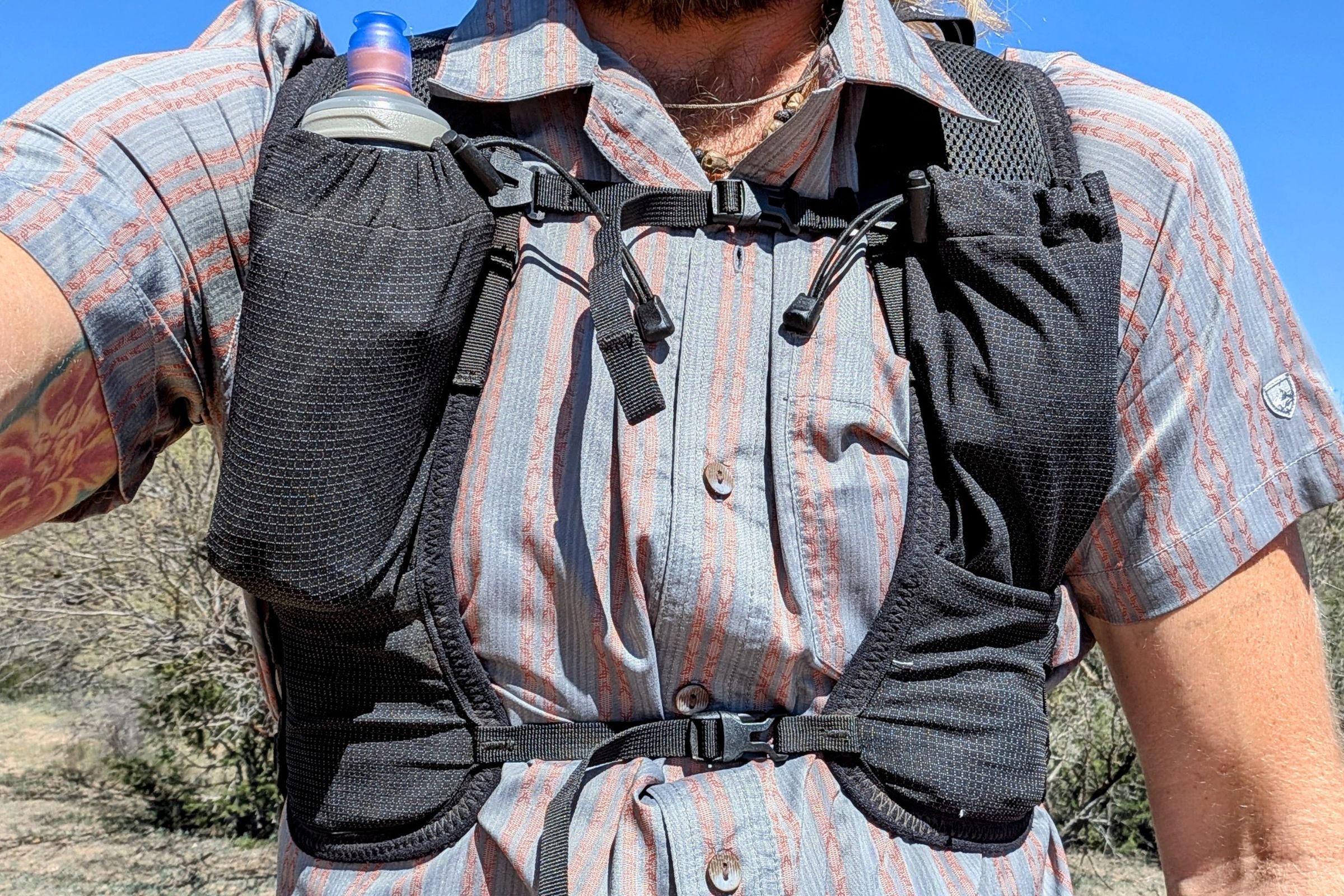   Close-up of the Pa’lante Joey vest-style shoulder straps, showing the front pockets and chest-mounted storage.  