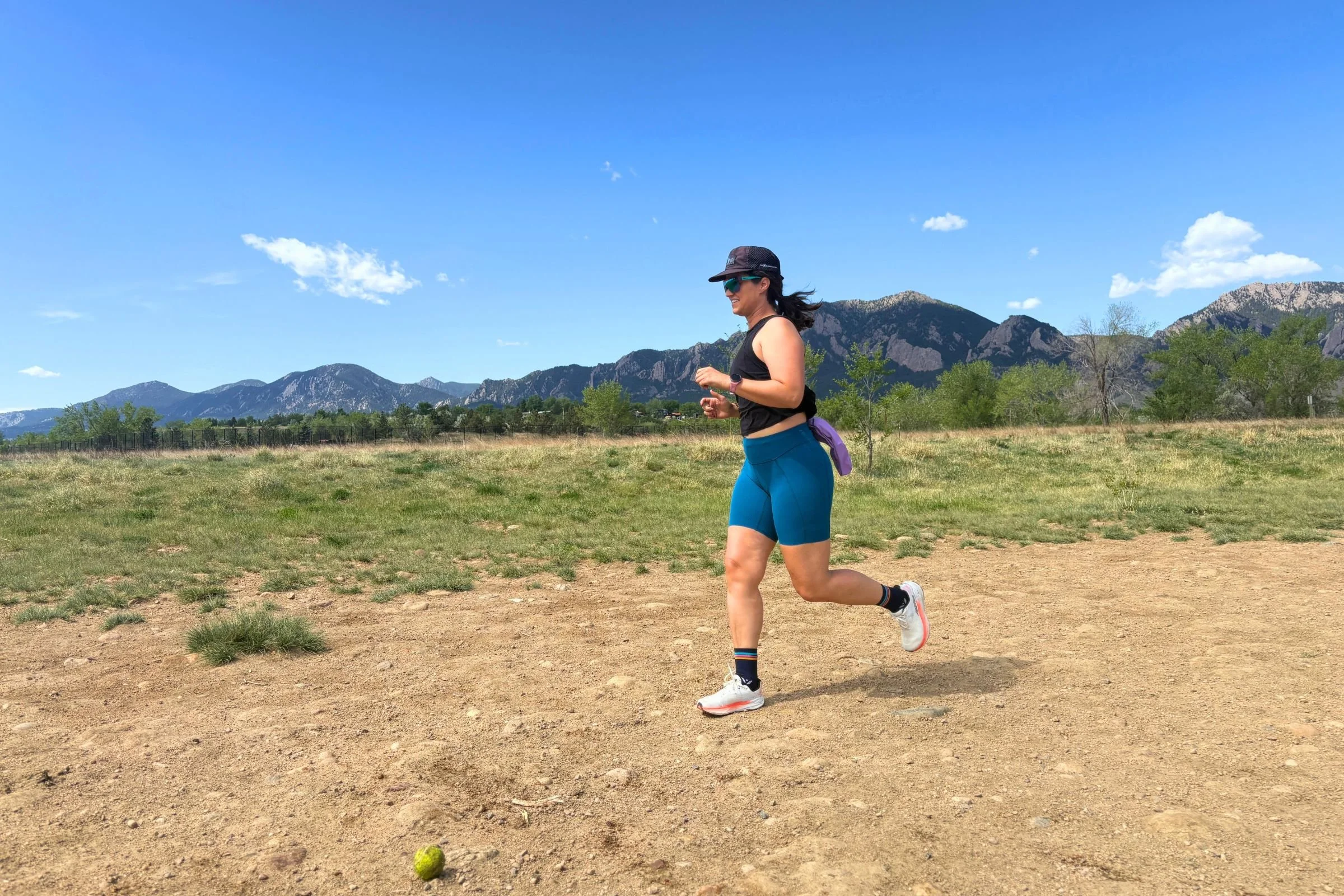   The Janji Pace Shorts are worn for a run across open terrain, where the lightweight, breathable fabric is well suited to warm-weather miles.  