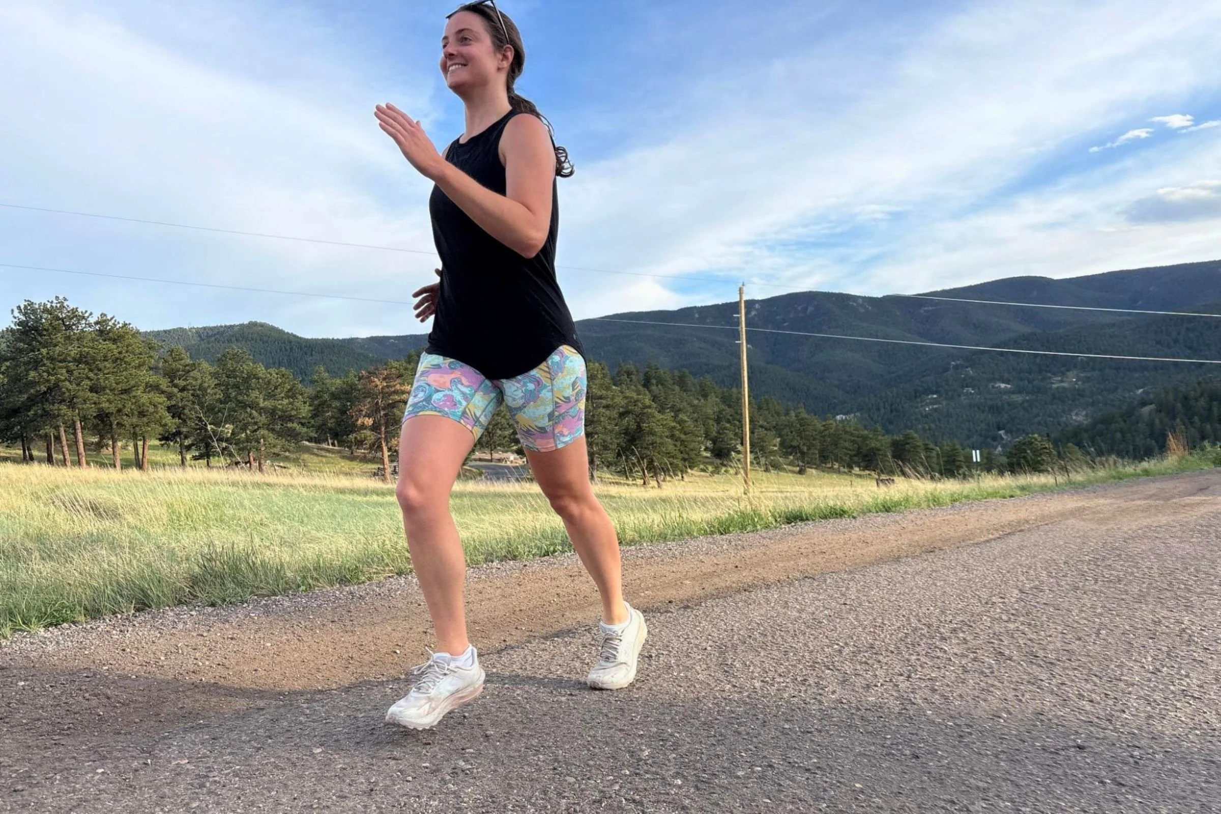   A runner wears the Patagonia Maipo shorts on a gravel road, with the longer 8-inch inseam providing coverage while the lightweight fabric keeps the fit feeling minimal.  