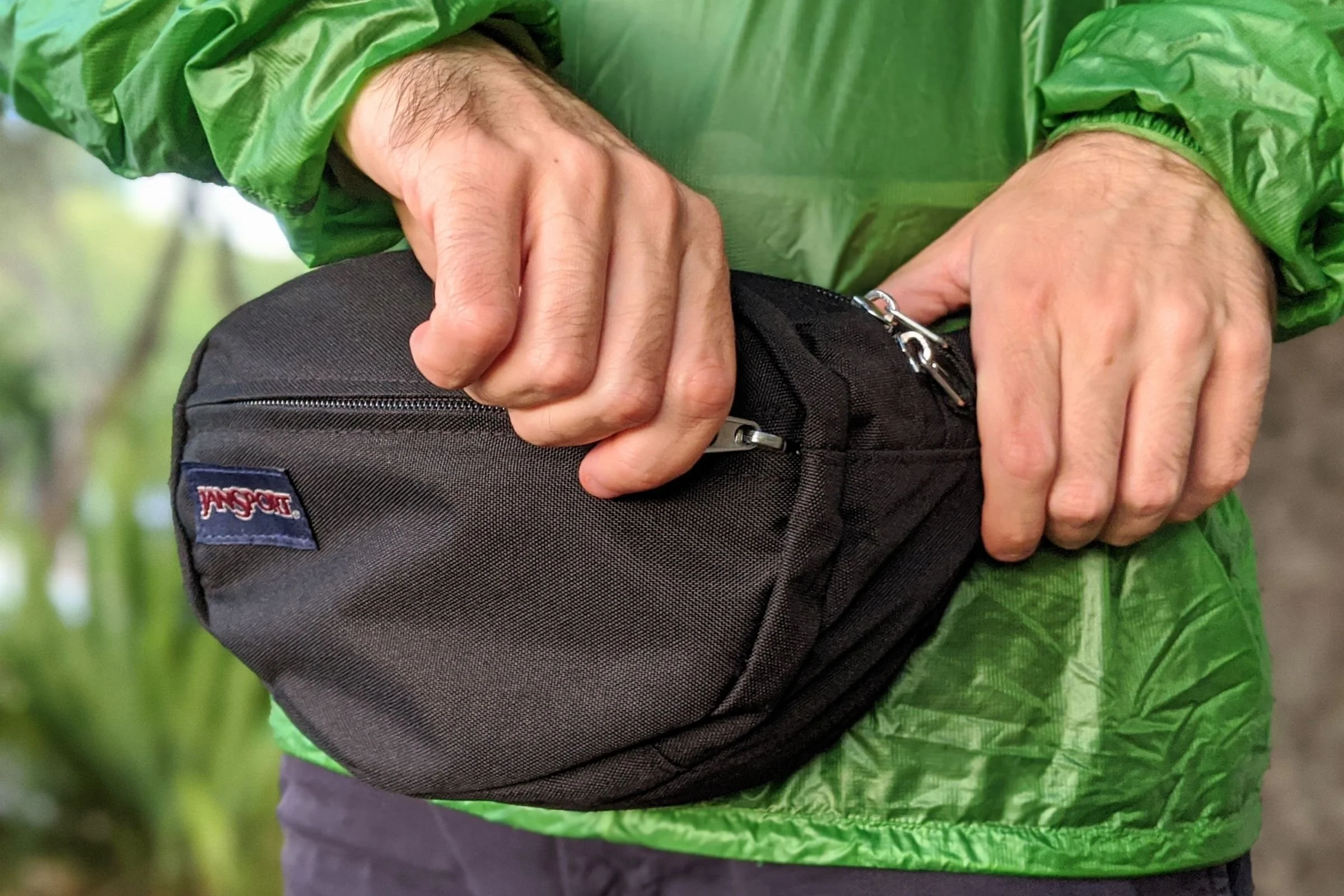   The JanSport Fifth Avenue Fanny Pack has two zippered pockets for organizing essentials, and we found its polyester fabric surprisingly durable after more than three years of testing.   Photo by Liz Thomas  