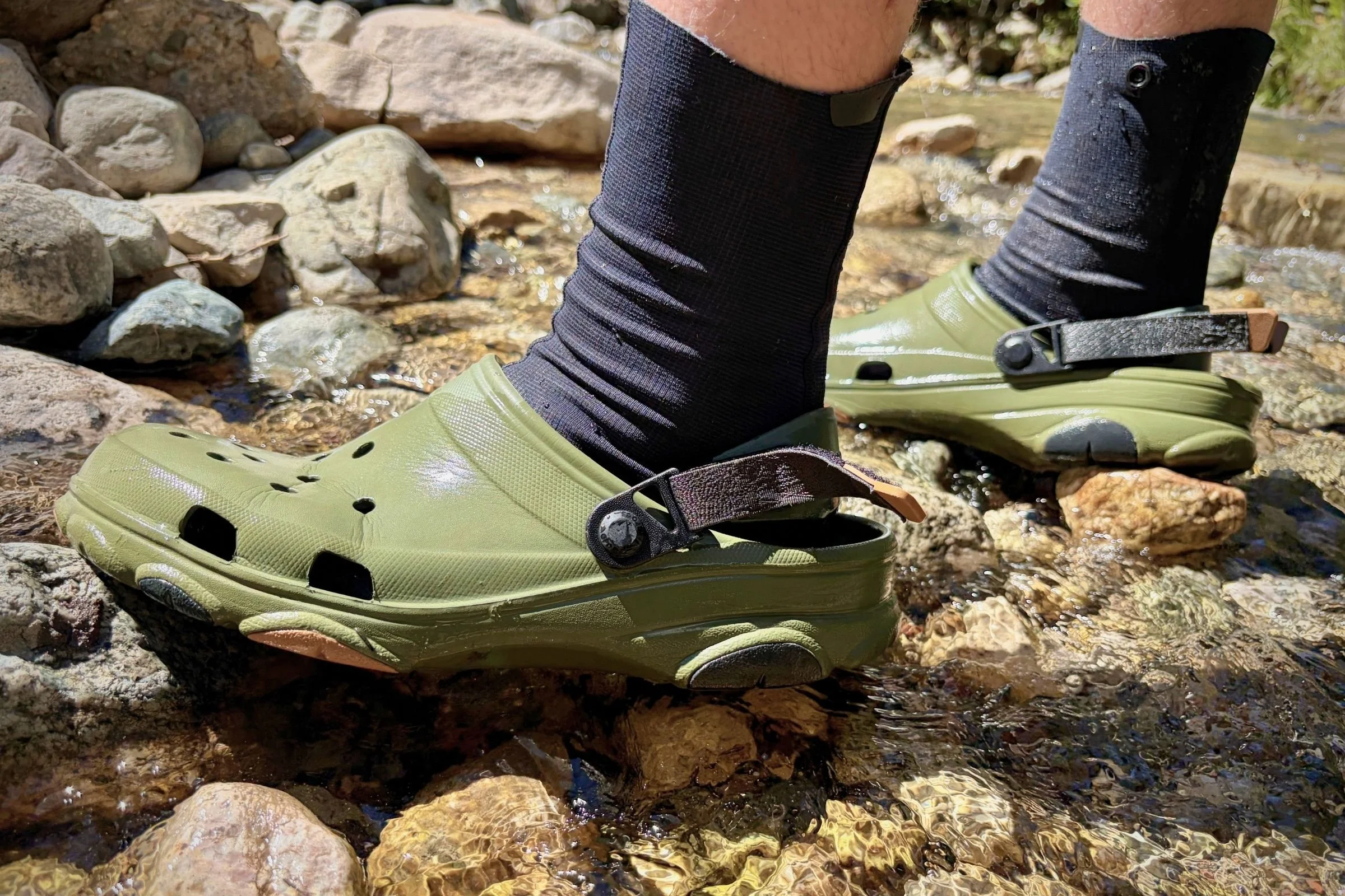   We tested the Crocs Classic All-Terrain Clogs while wet wading and found their wide, soft design molded over rocks to help with balance and stability.  