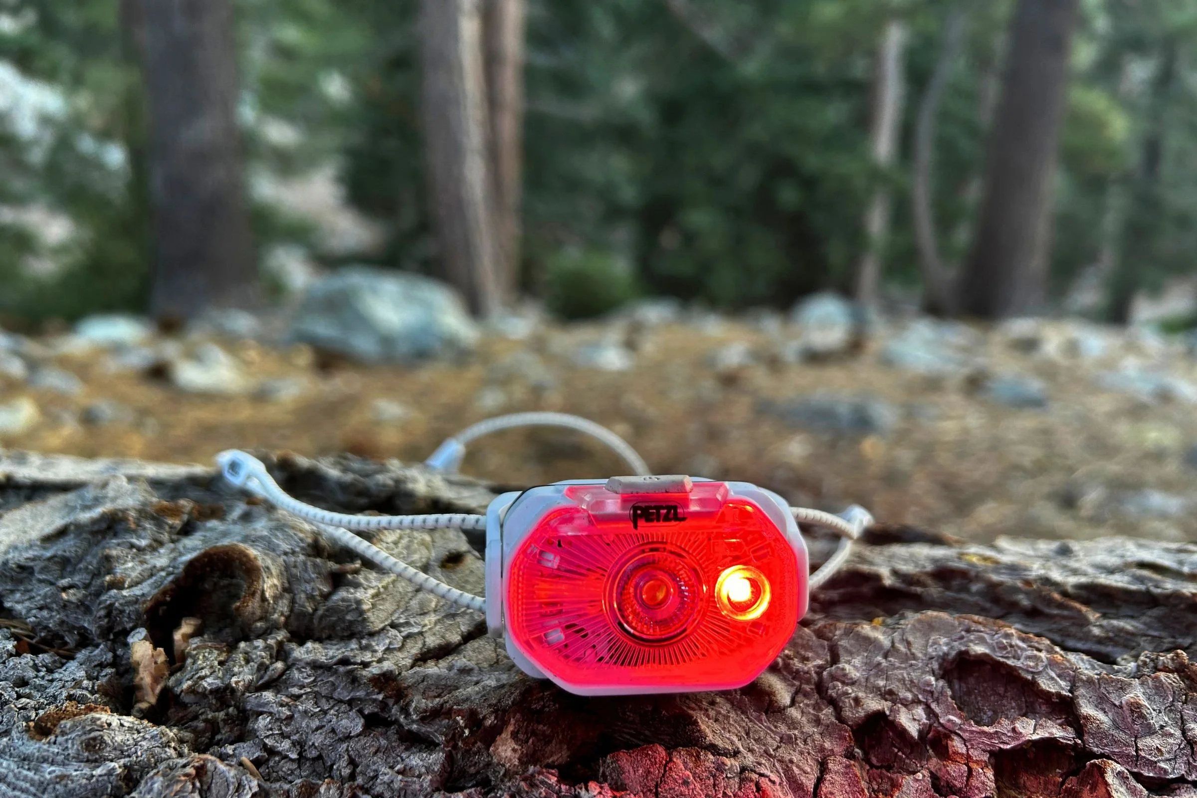   The Petzl Swift LT includes a red-light mode that helps preserve night vision and is useful for camp chores around other backpackers.  