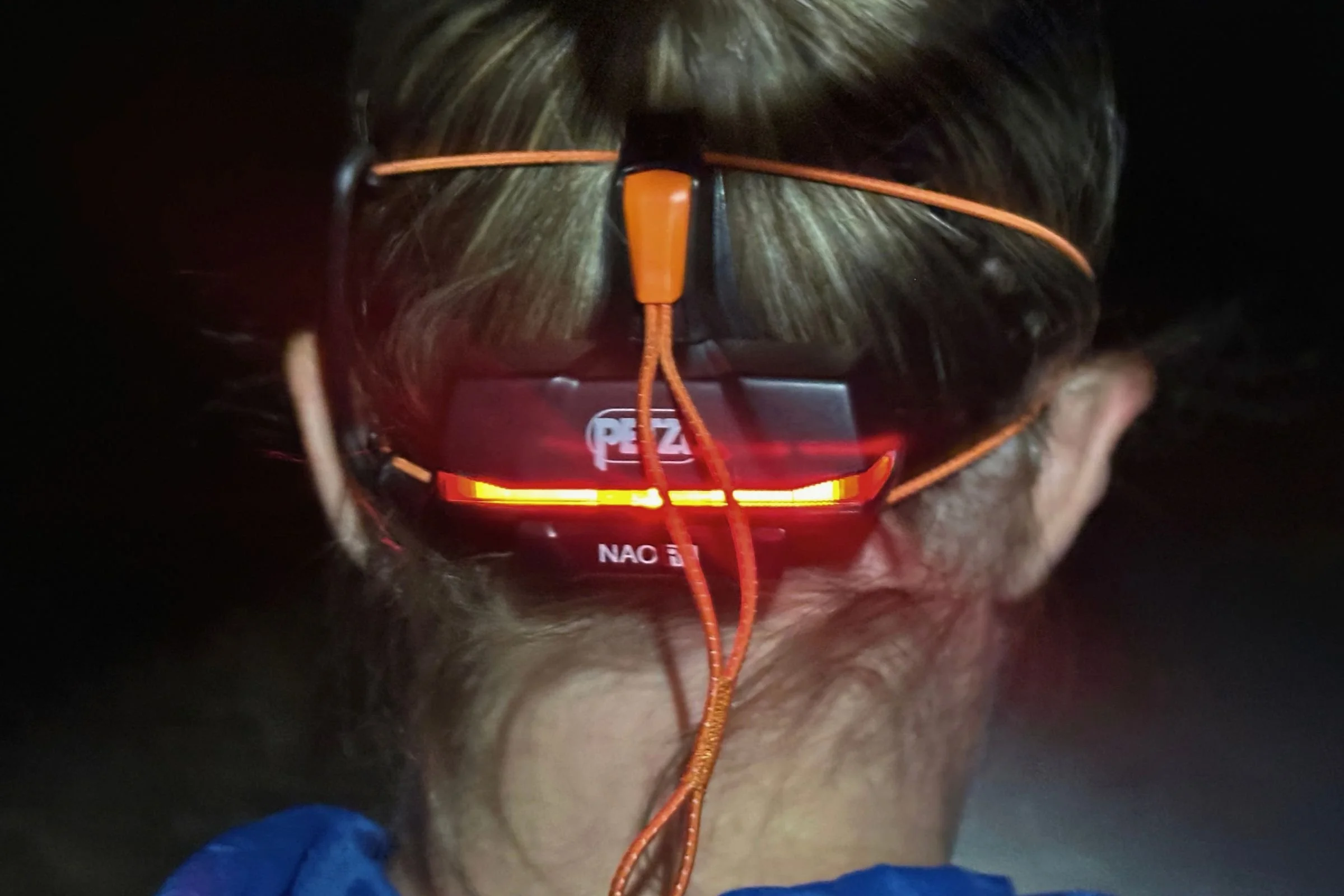   The rear battery pack on the Petzl NAO RL includes a red light with separate on, off, and strobe controls for nighttime visibility.  