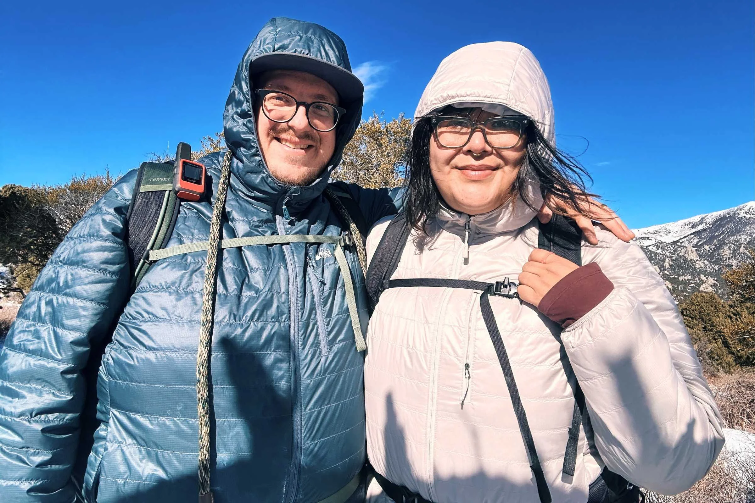 Clayne Zollinger (left) and Gabi Reyes-Acosta (right), both wearing the Osprey Talon/Tempest Packs.