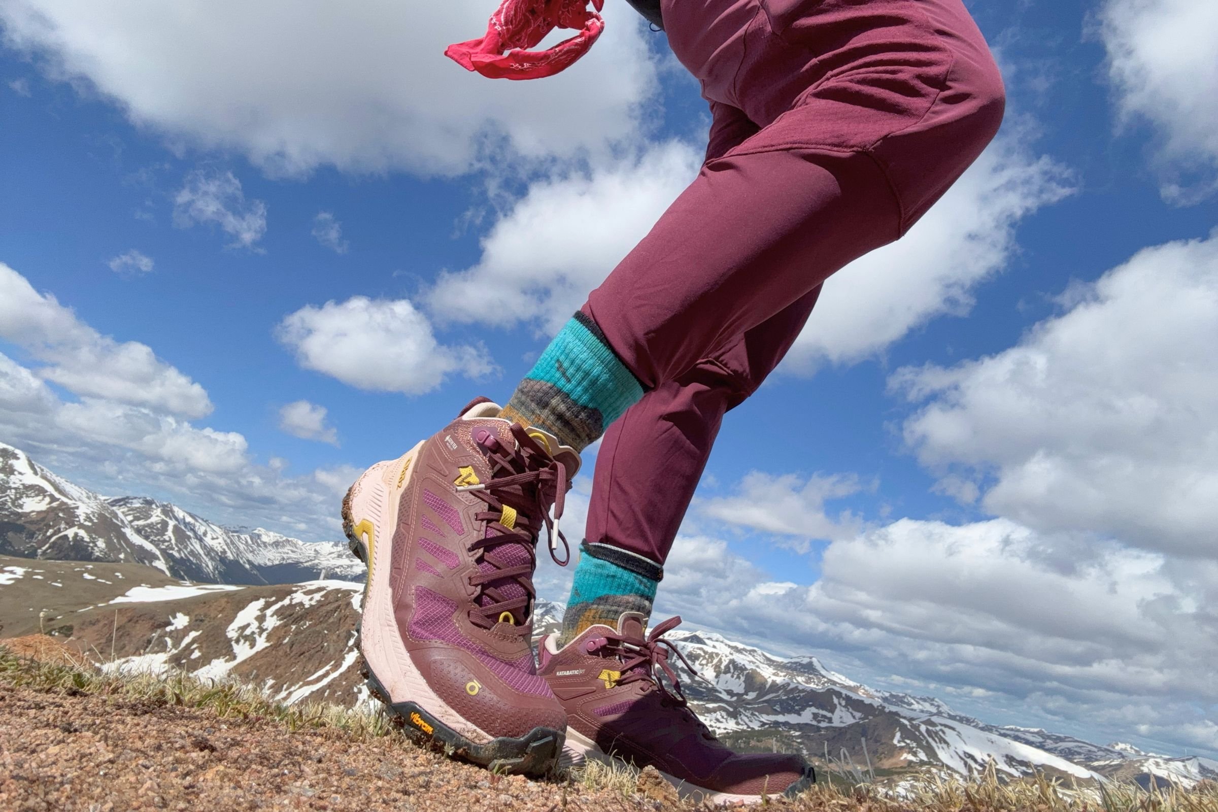 Side Profile of the Oboz Katabatic RT Mid on snowy mountaintop