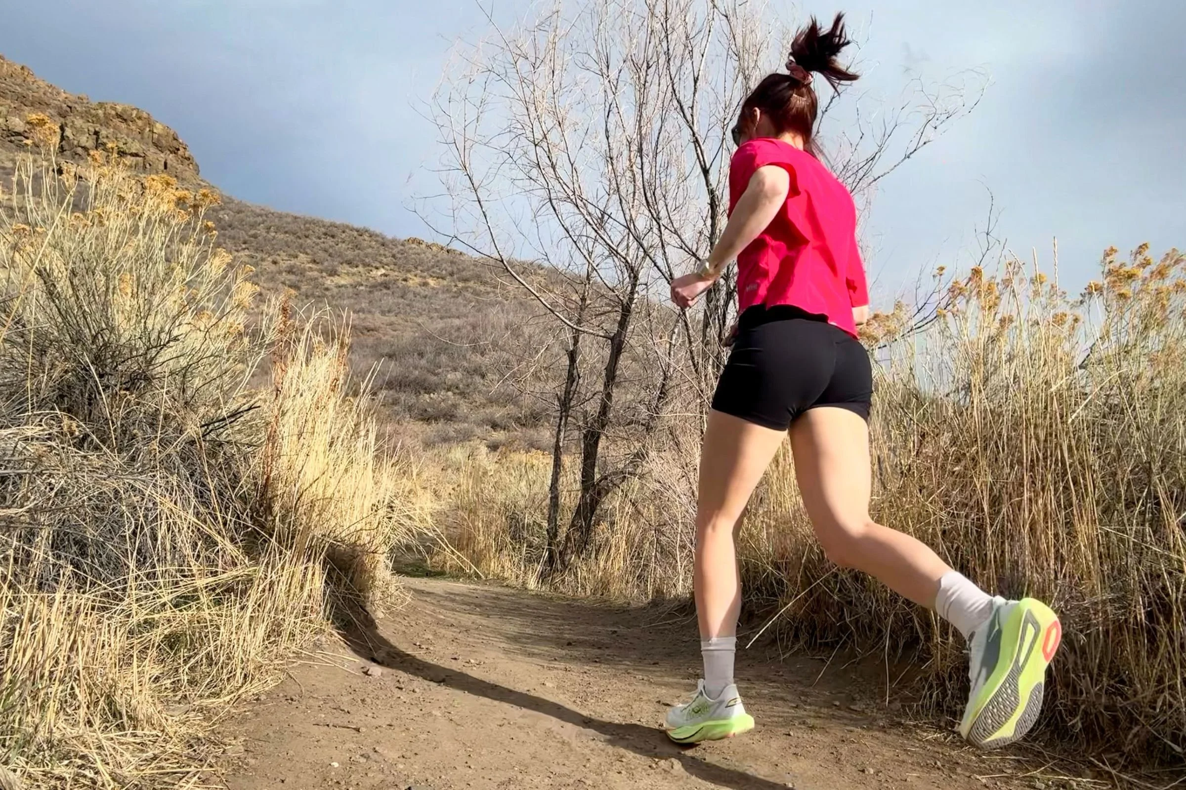 REI Swiftland Grid Cropped Tee being worn on a dirt path run