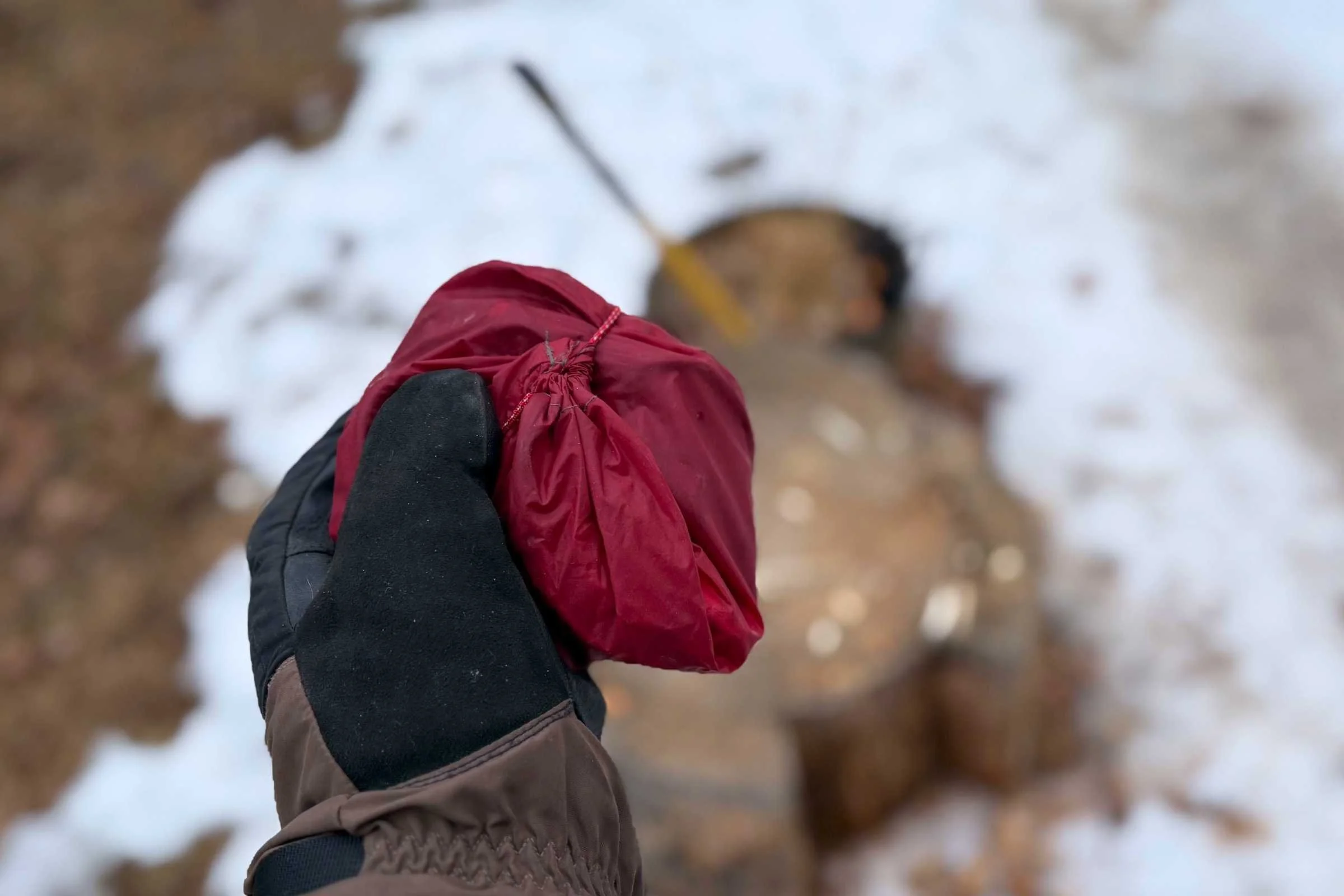 the microspikes ghosts packed down small in a red bag