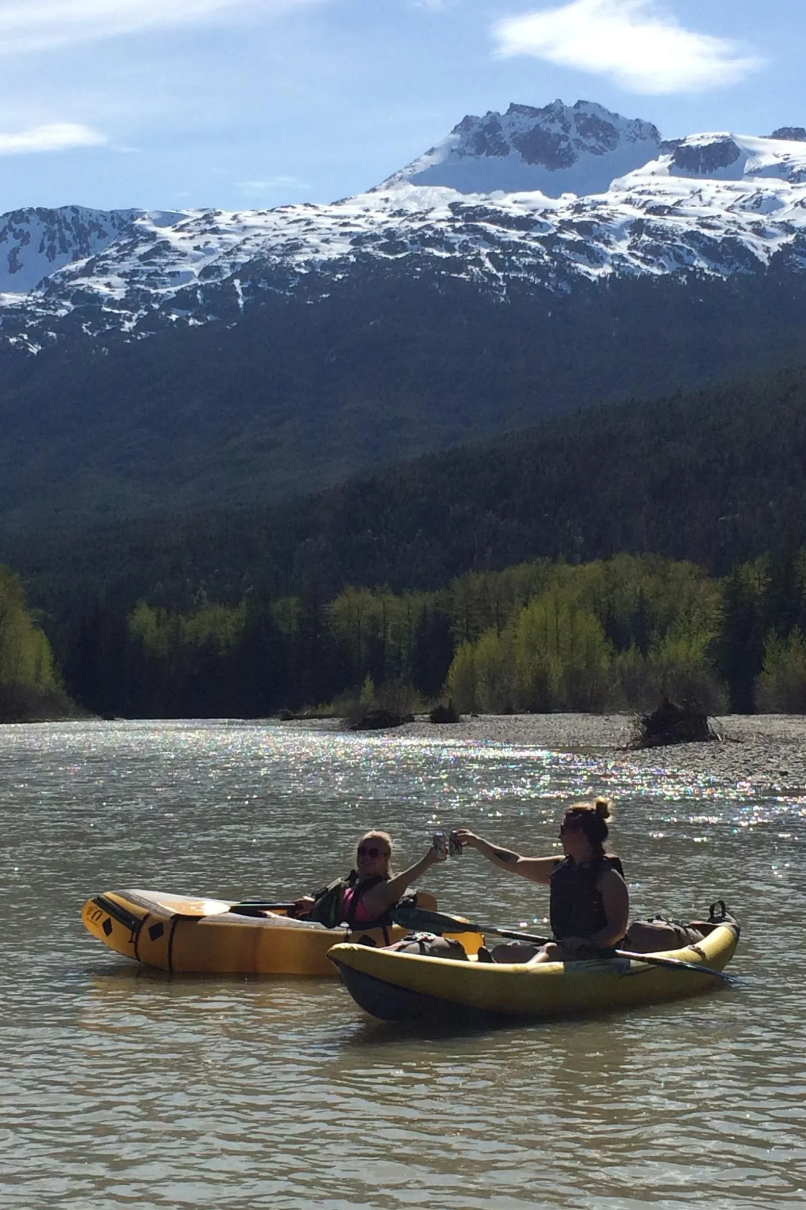 Sarah (left) wearing the Astral Layla PFD, and Josette (right) wearing the NRS Vapor on the Taiya River, Dyea, Alaska.