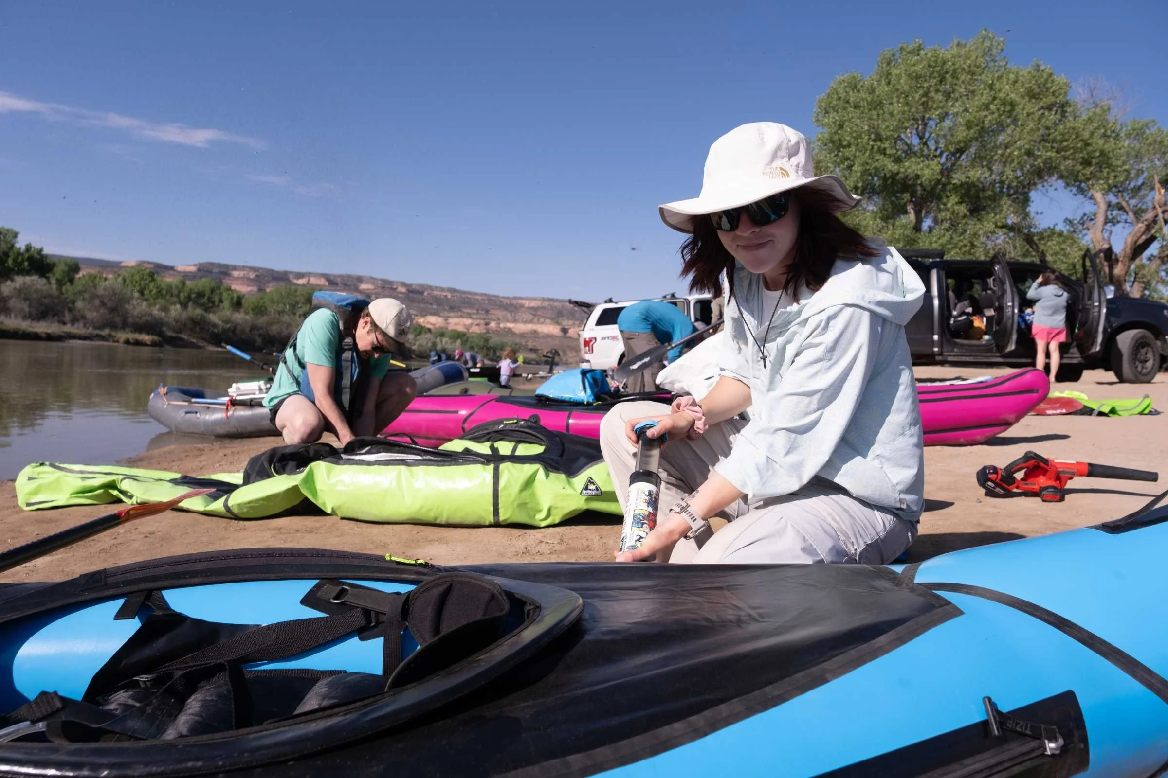 Inflating the Alpacka Raft Chinook on the beach