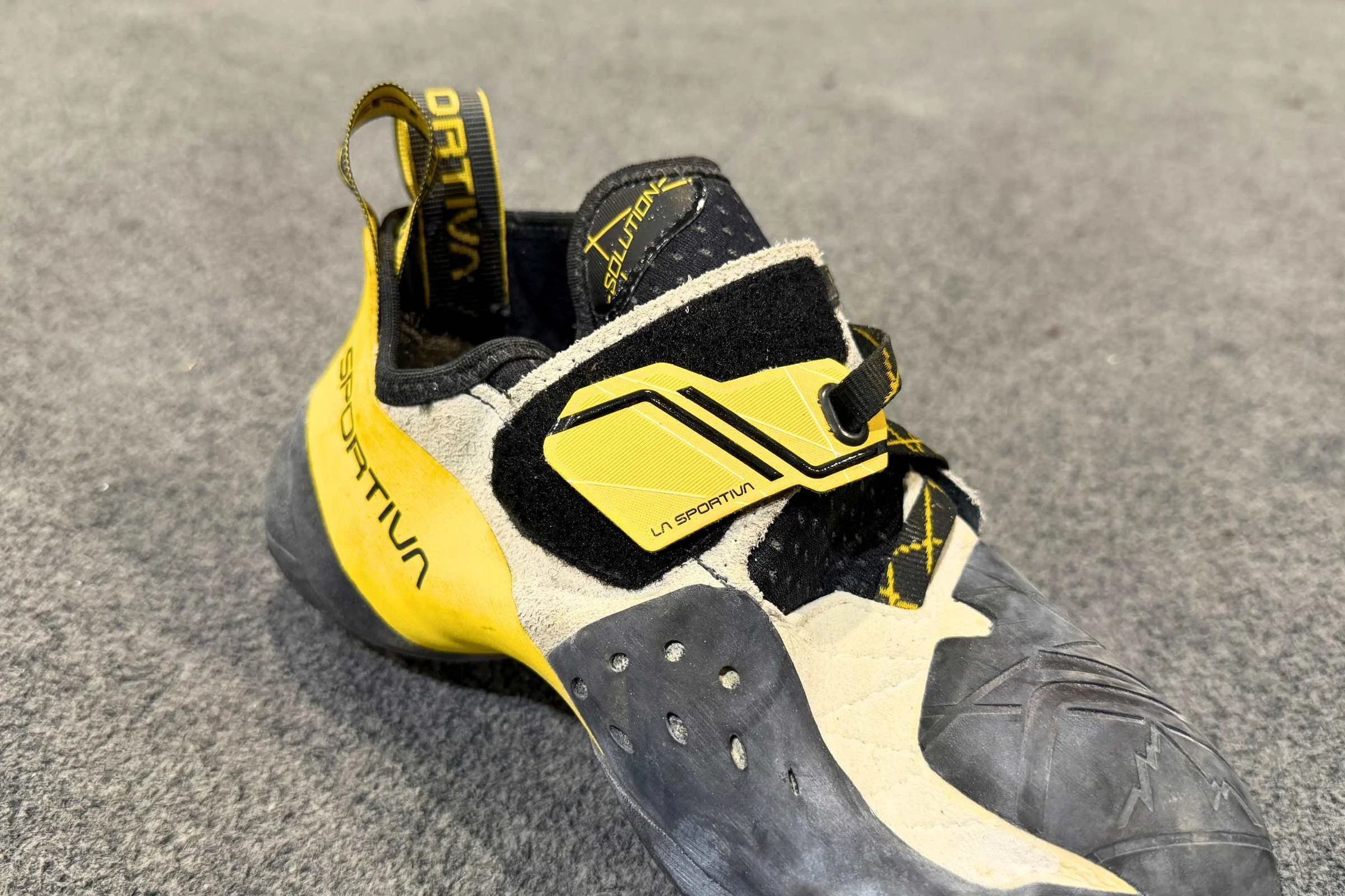 La Sportiva Solution on a gym floor