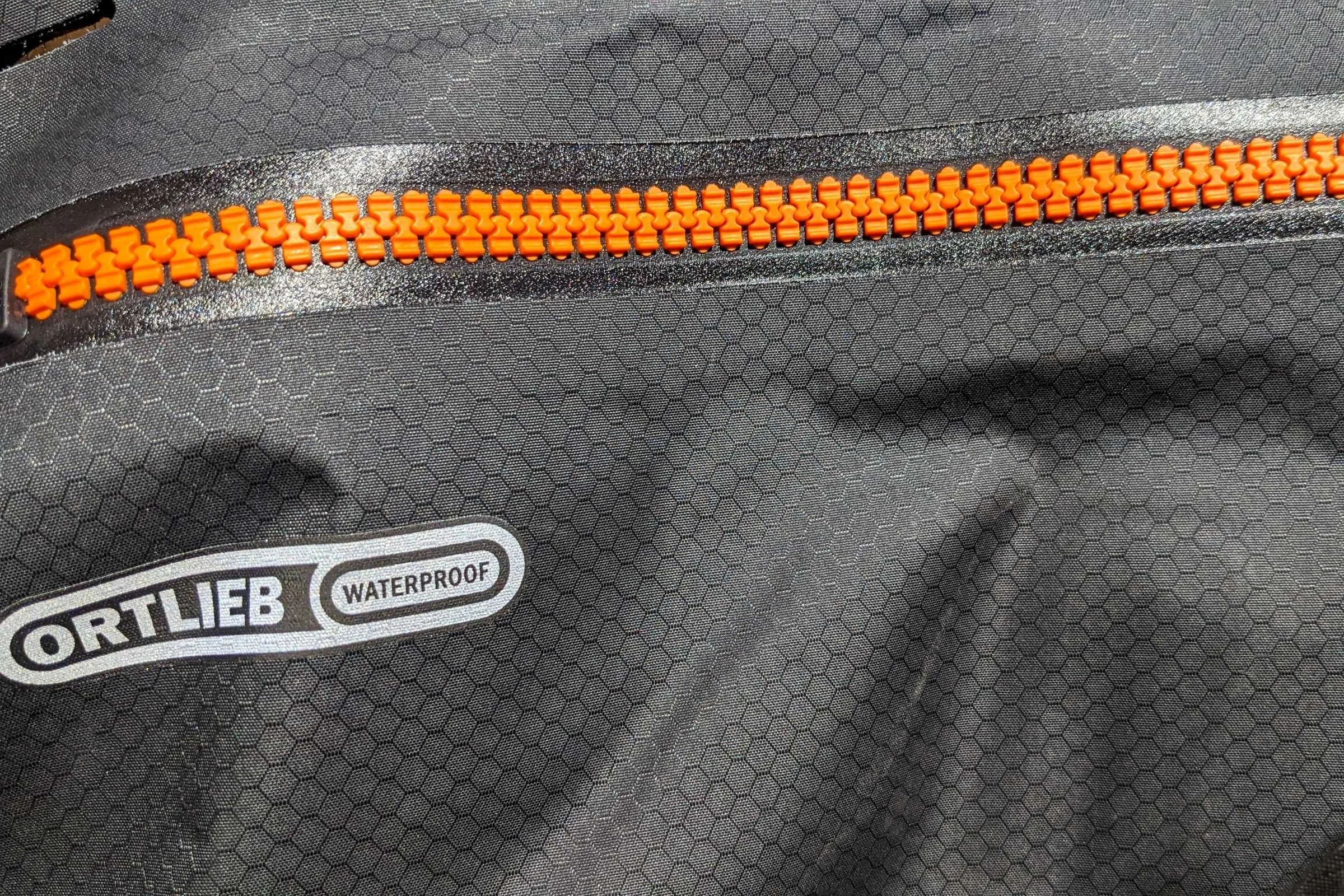 ORTLIEB zippers and fabric are 100% waterproof. Most other bike bags have water resistant material but do not have taped seams.