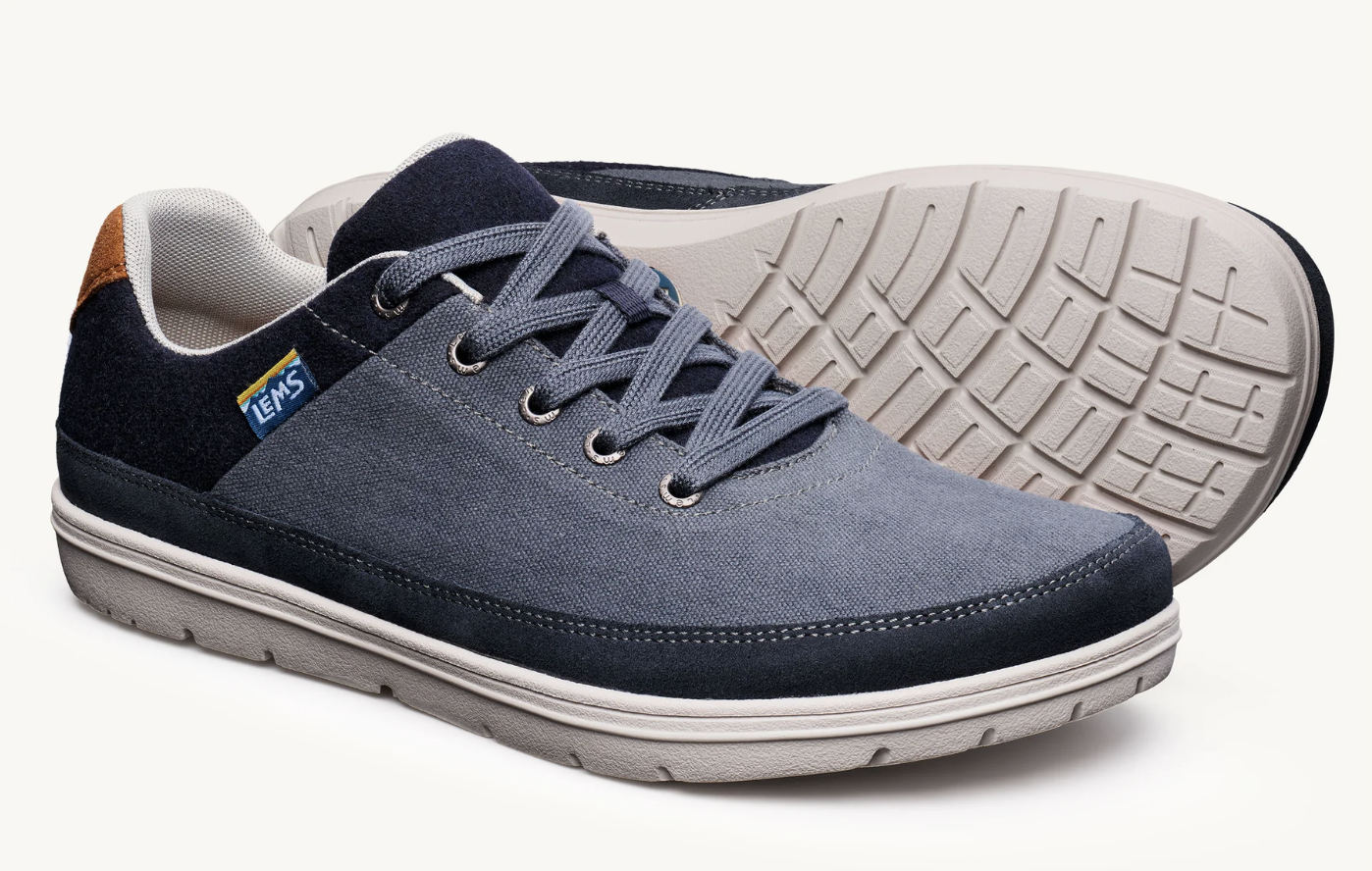 Closeup of the Lems Chillum shoes in navy blue with dark blue and white trim
