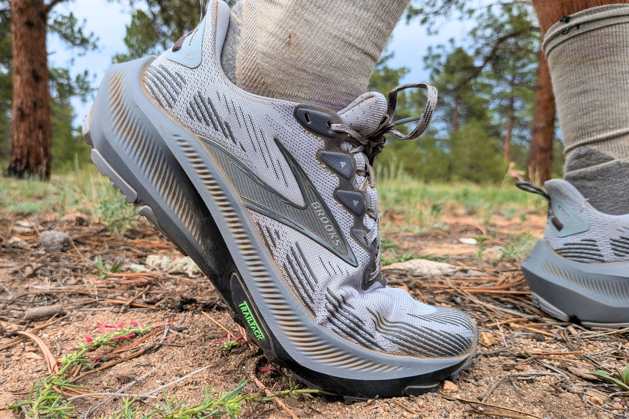 Close-up of Brooks Ghost trail running shoes from the side.