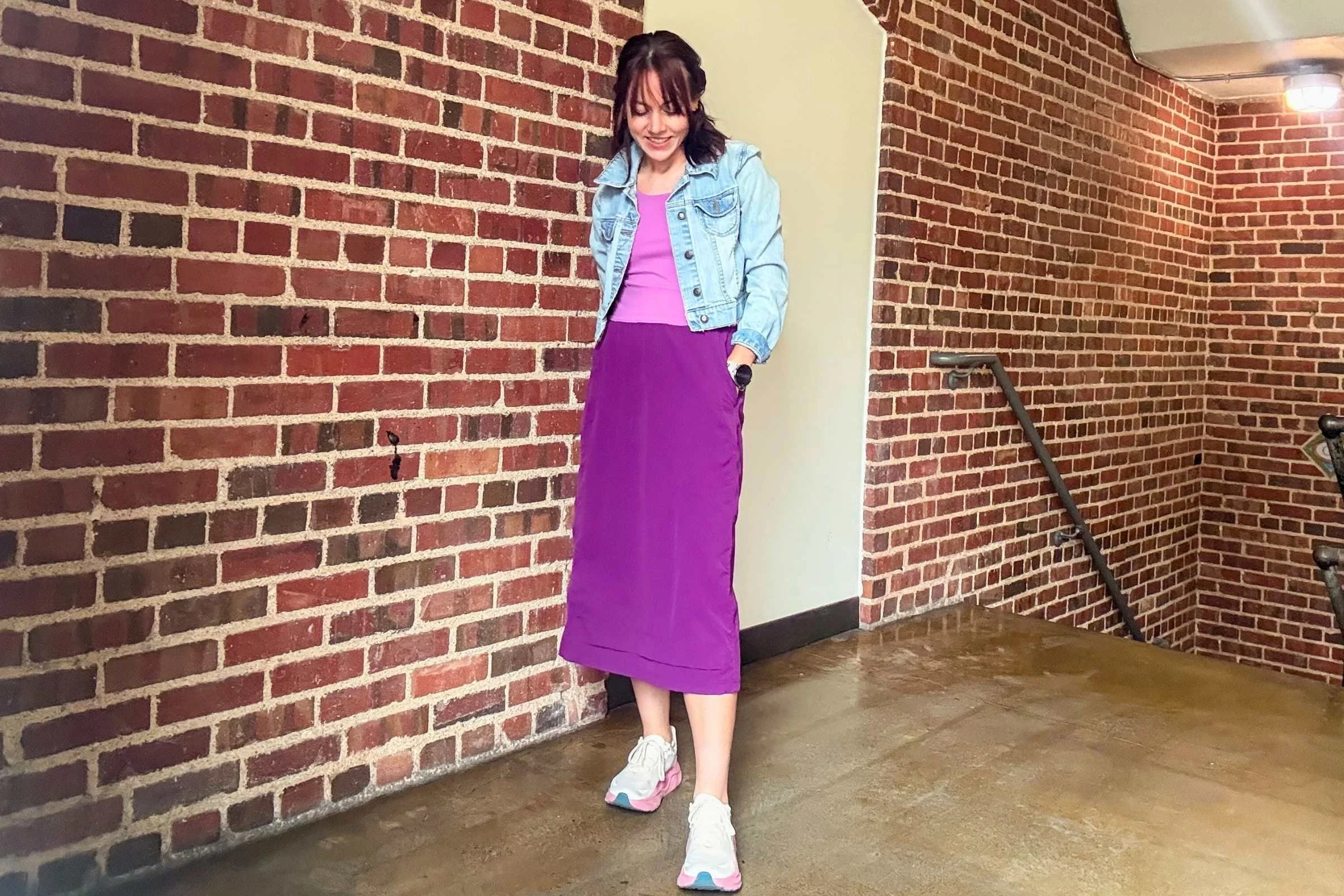 Wearing the Title Nine Limitless Midi Dress in the stairwell while testing on the stairs