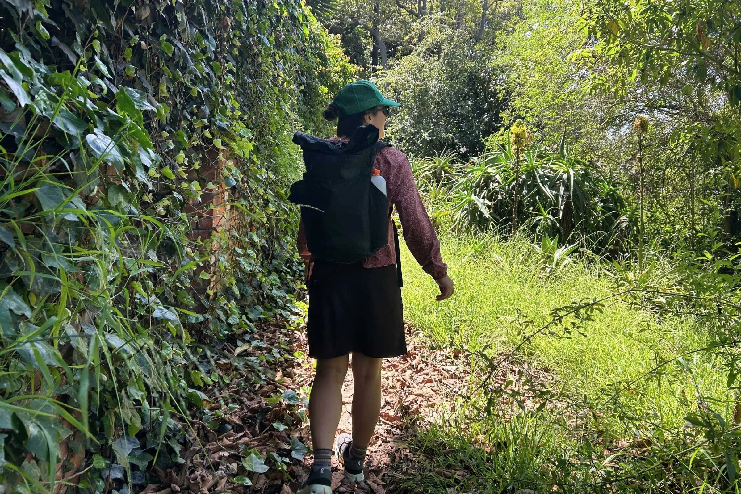 author wearing the ula ultra node 20l backpack on a sunny hike