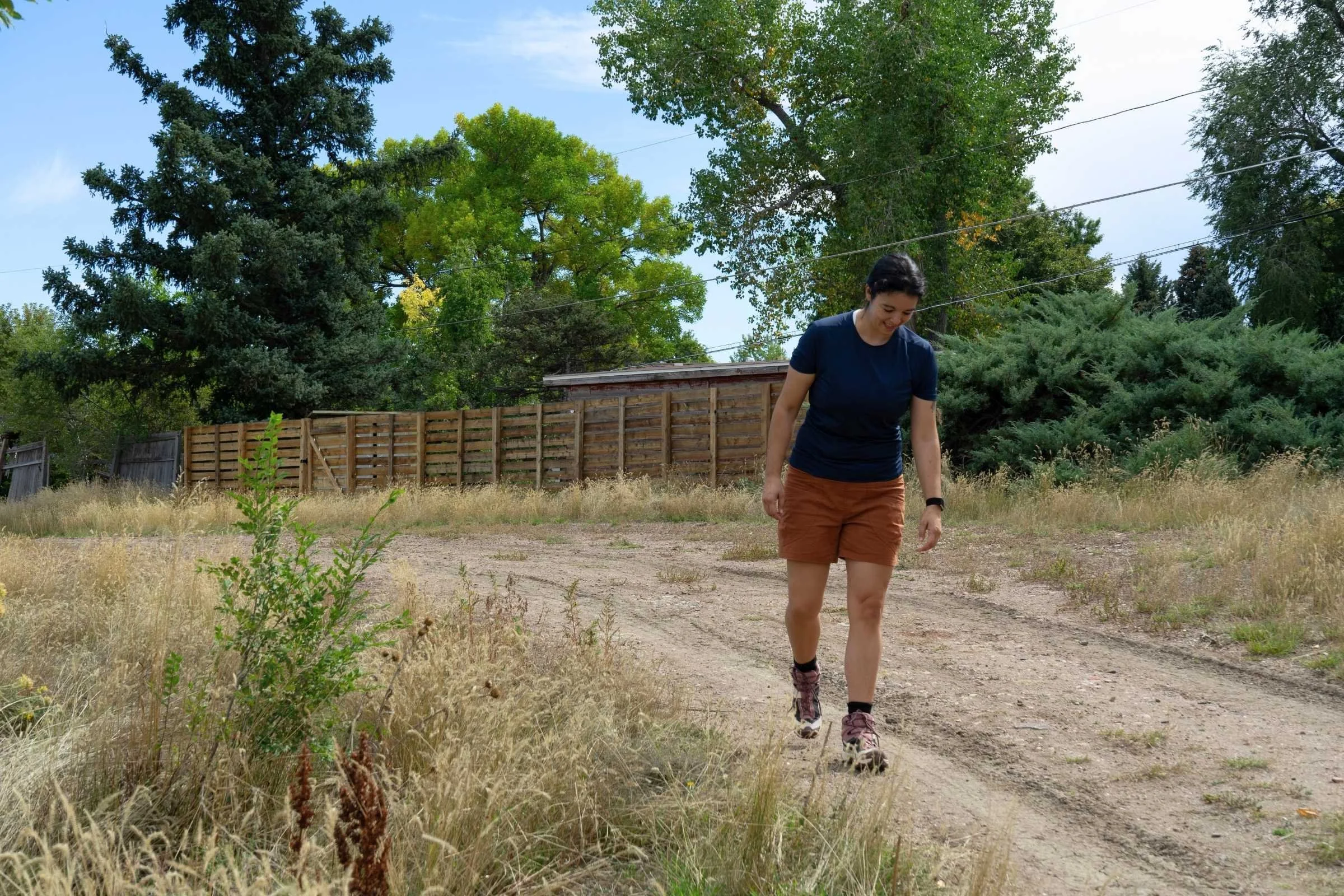Person hiking a groomed trail in Salomon X Ultra 5 hiking boots