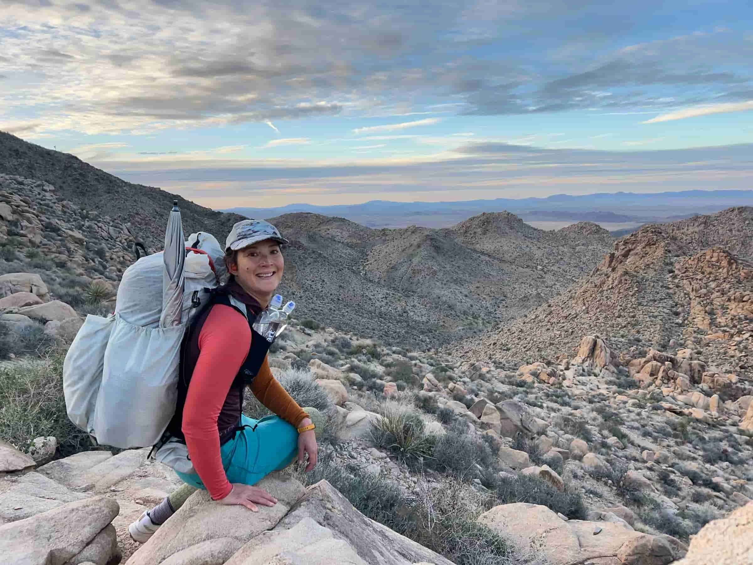 ortovox comp light hoodie on a backpacker in the desert