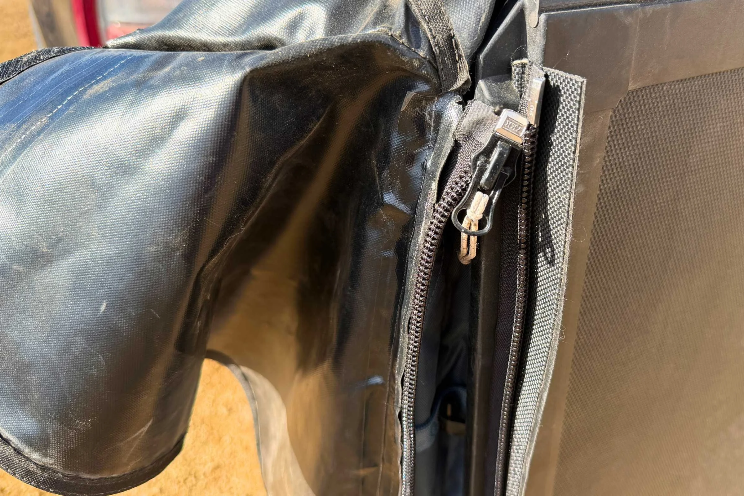 The tent cover is nice, I just wish it was easier to put on and its zippers were smoother.