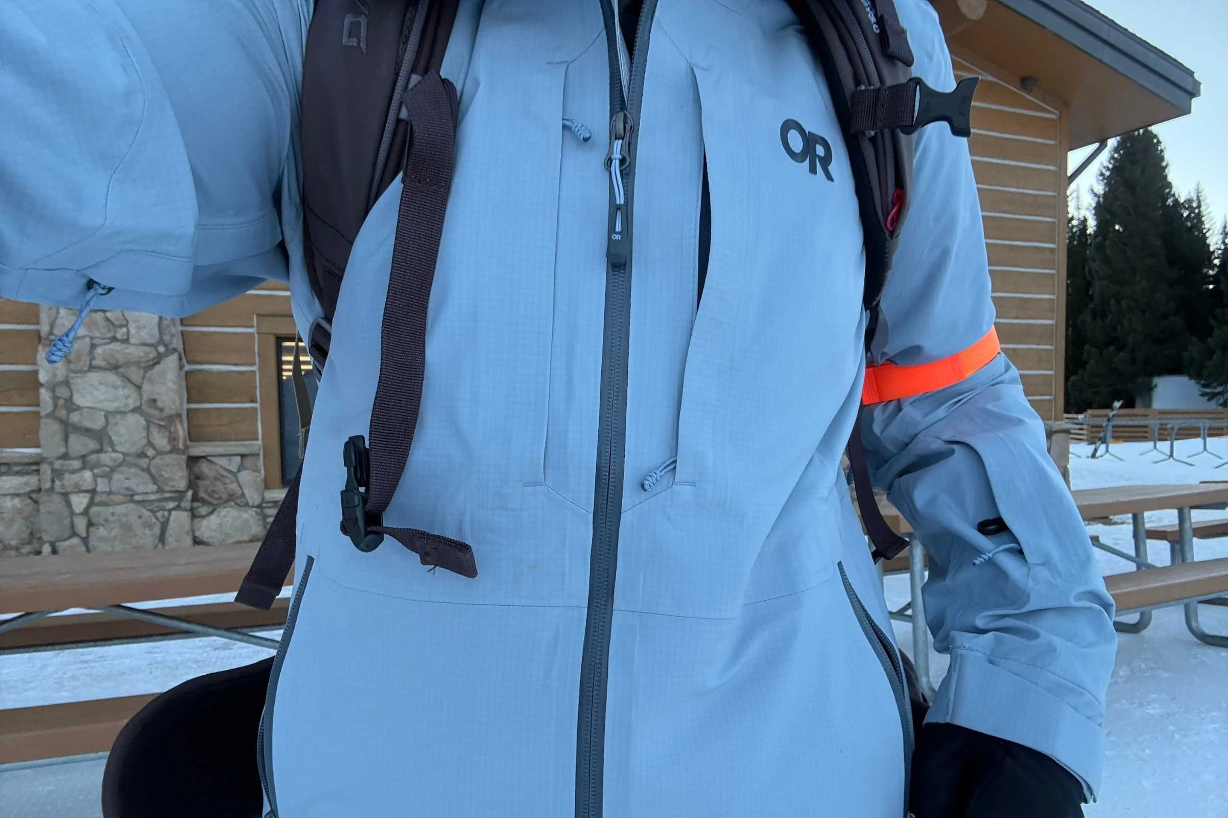 A pack fitting over the lightweight shell from Outdoor Research