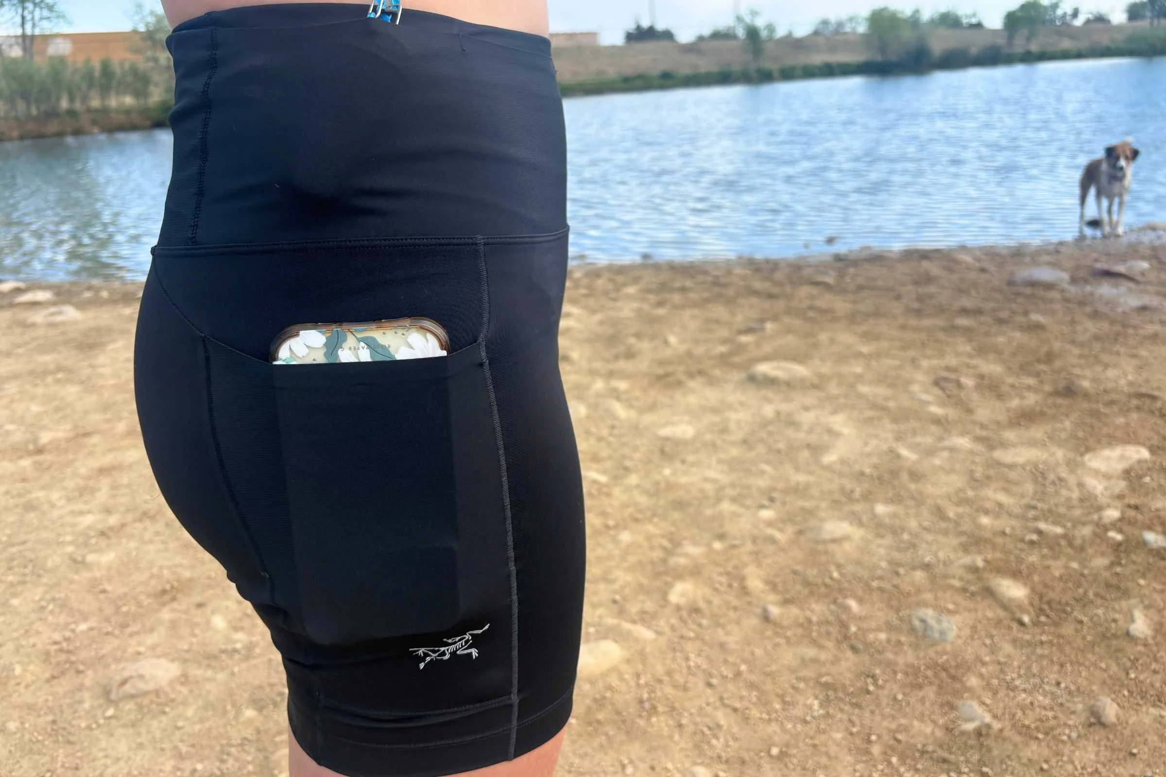 The side pockets are deep enough to hold a phone or even a small flask, and are tight enough that no items bounce around.