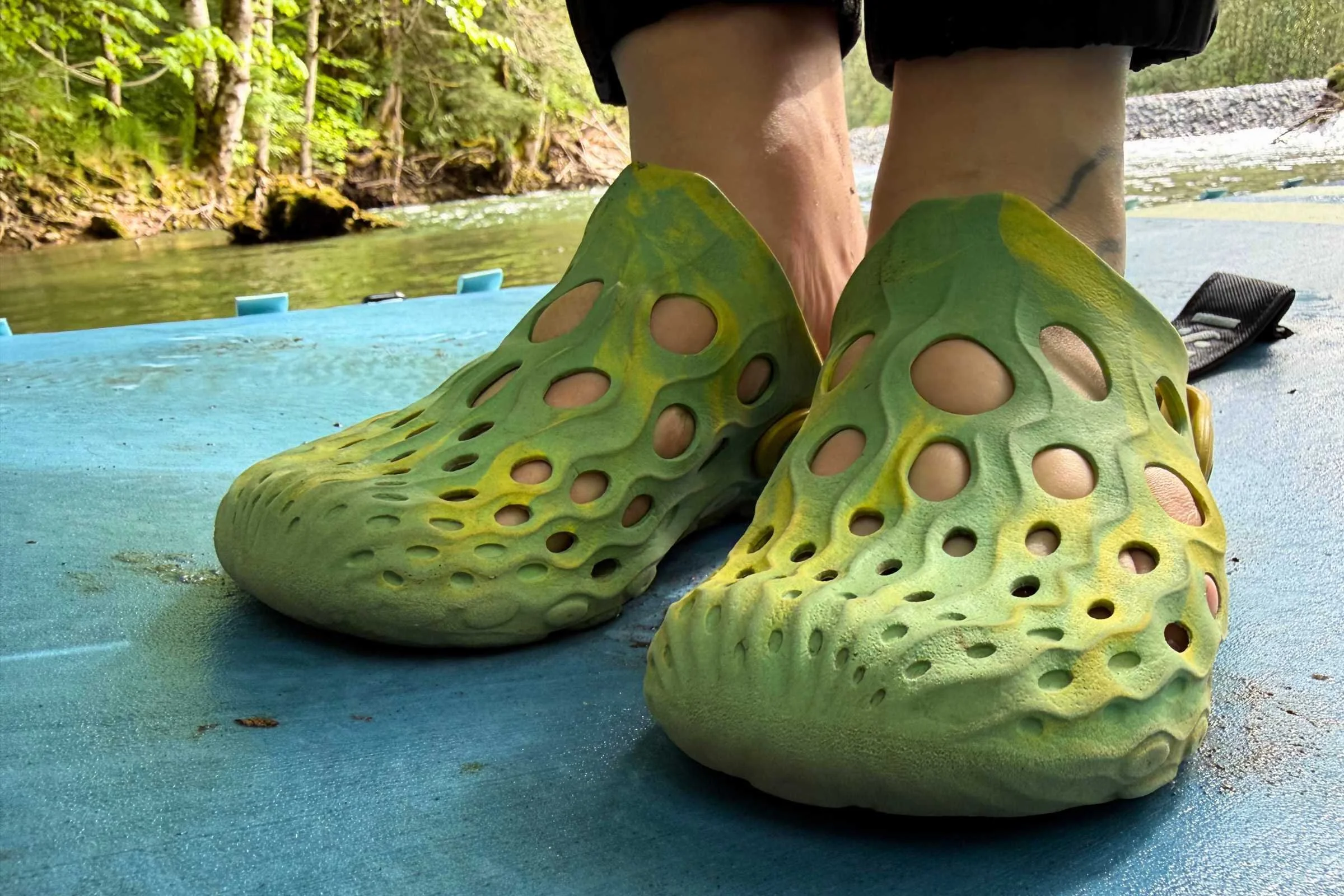 the Merrell Hydro Moc shoes in green/yellow