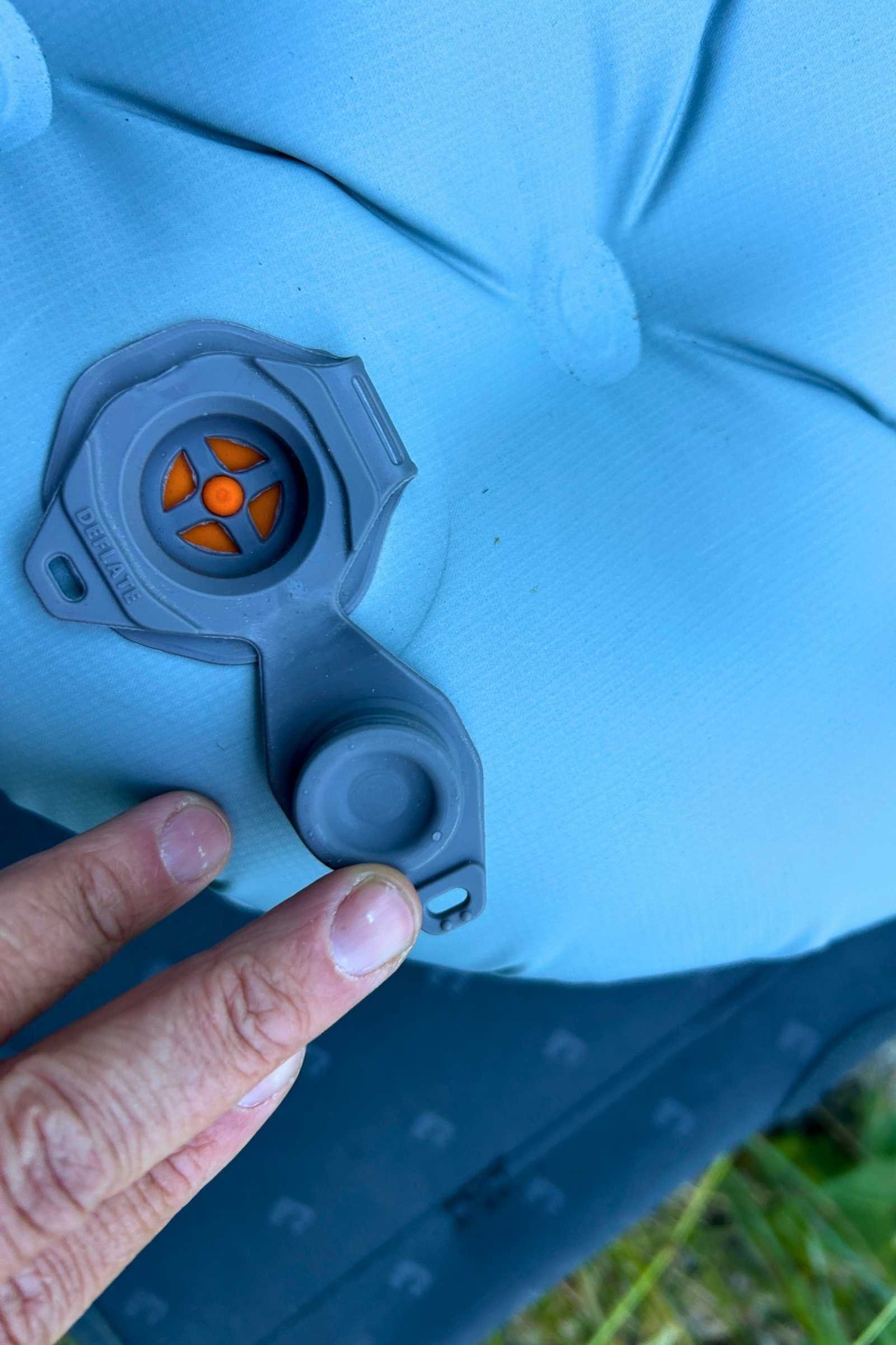 Deflation valve on the Sea to Summit Ether Light XR Insulated Air sleeping pad.