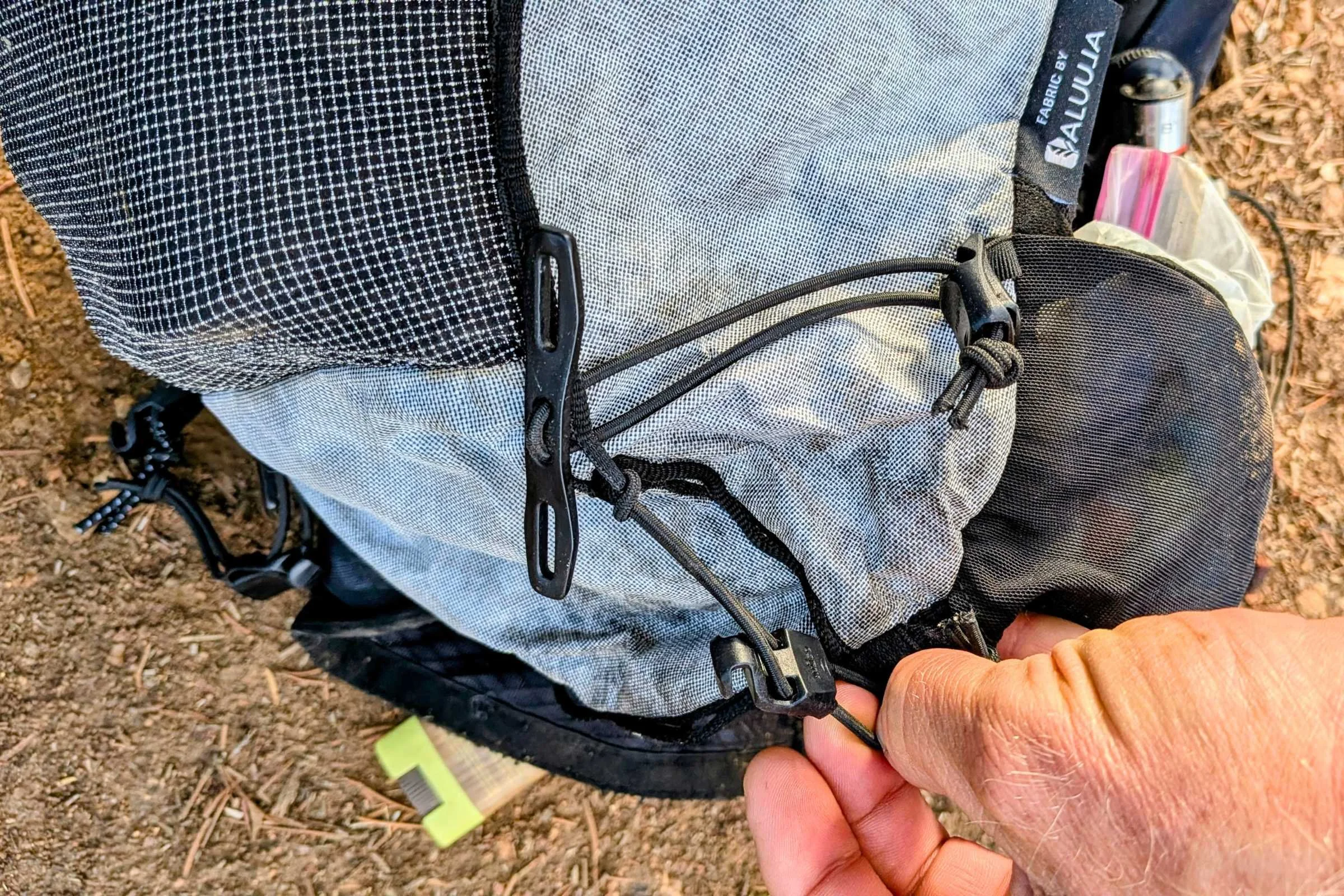Hyperlite Mountain Gear Pemi 15 Running Vest front view showing pocket layout and strap configuration