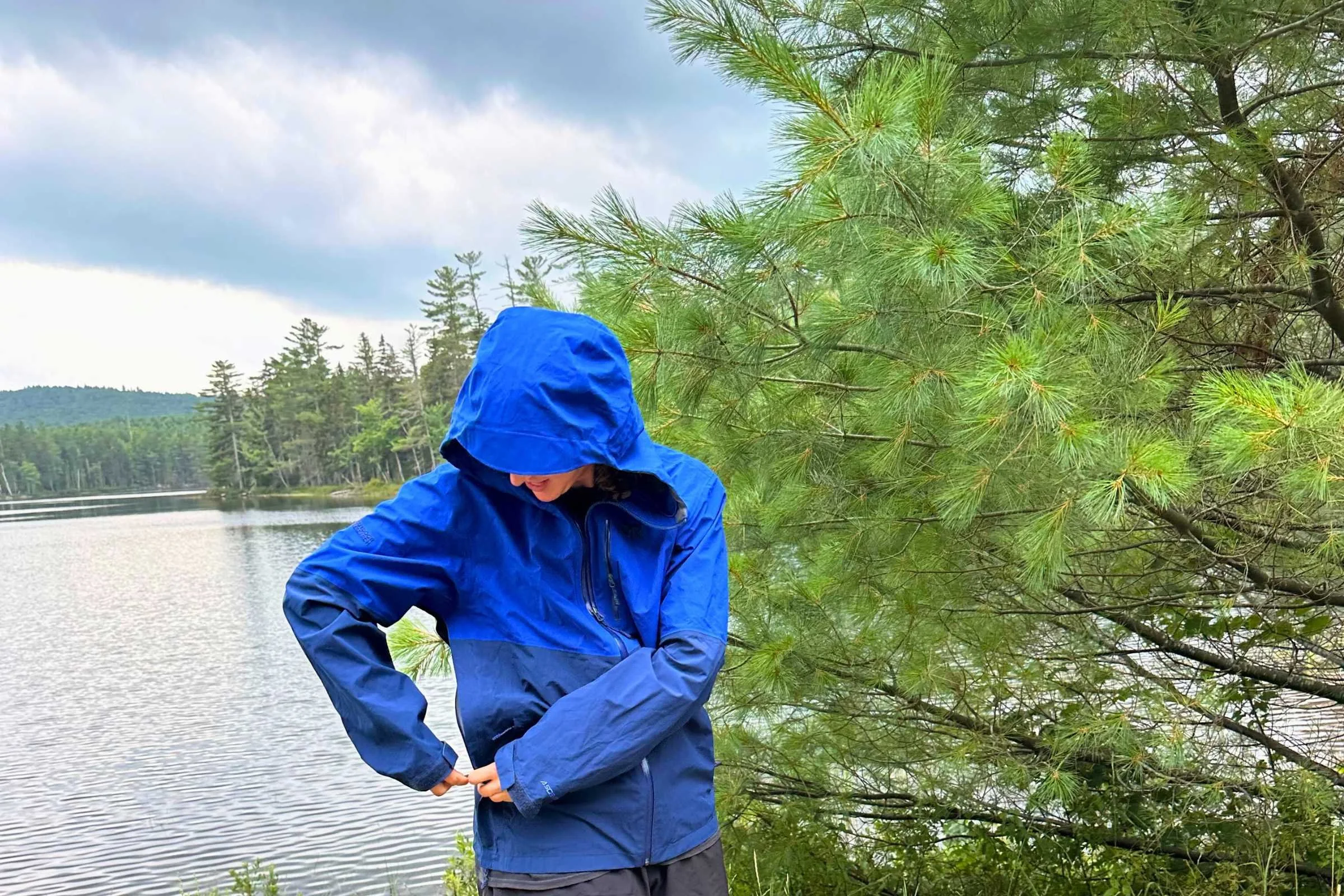 Elliot looking for something in the pocket of the Foray jacket
