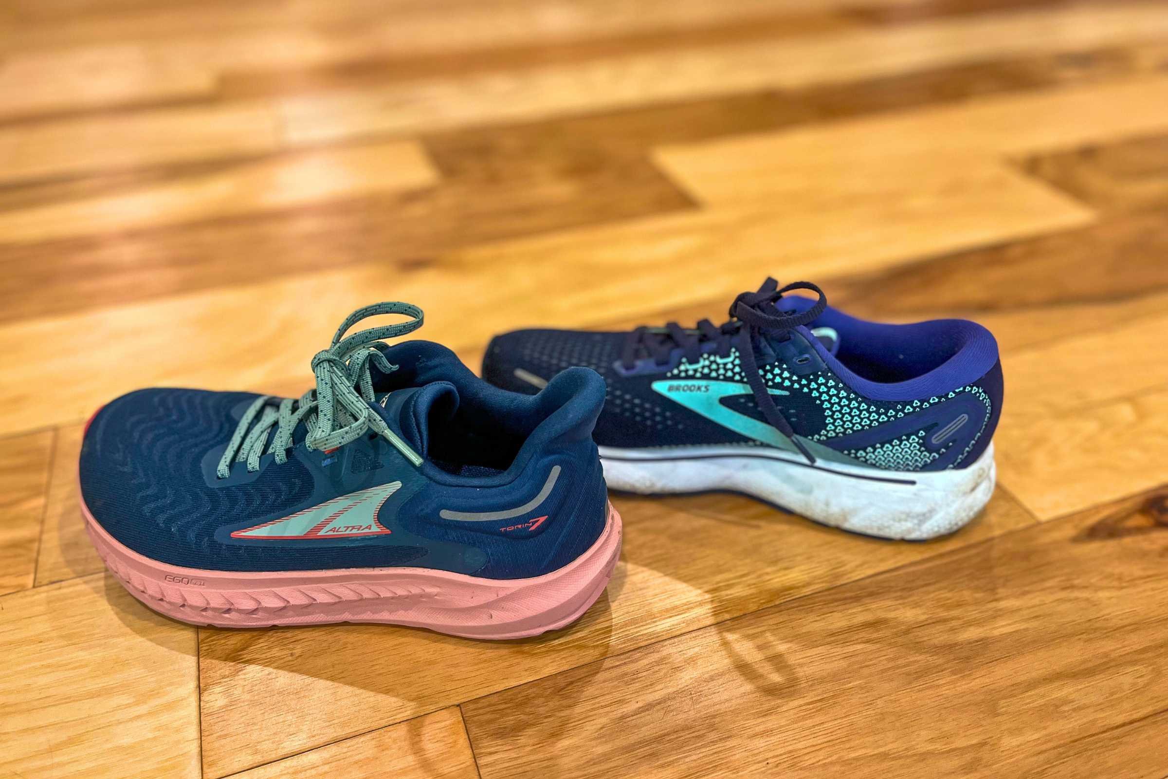 The Altra Torin 7 (left) is a zero-drop shoe and the lowest drop we tested, while the Brooks Ghost (right) has 12 mm of drop and is the highest drop we tested.