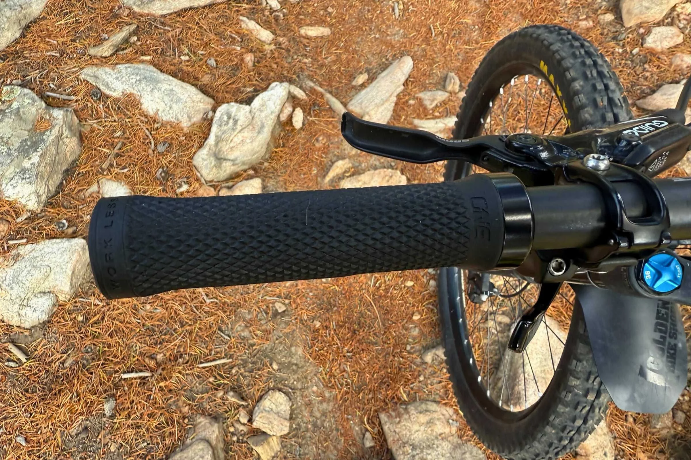 The OneUp Components Grips were decent, but we didn’t like that the plastic collar didn’t extend around the whole grip. Courtesy Chris Meehan