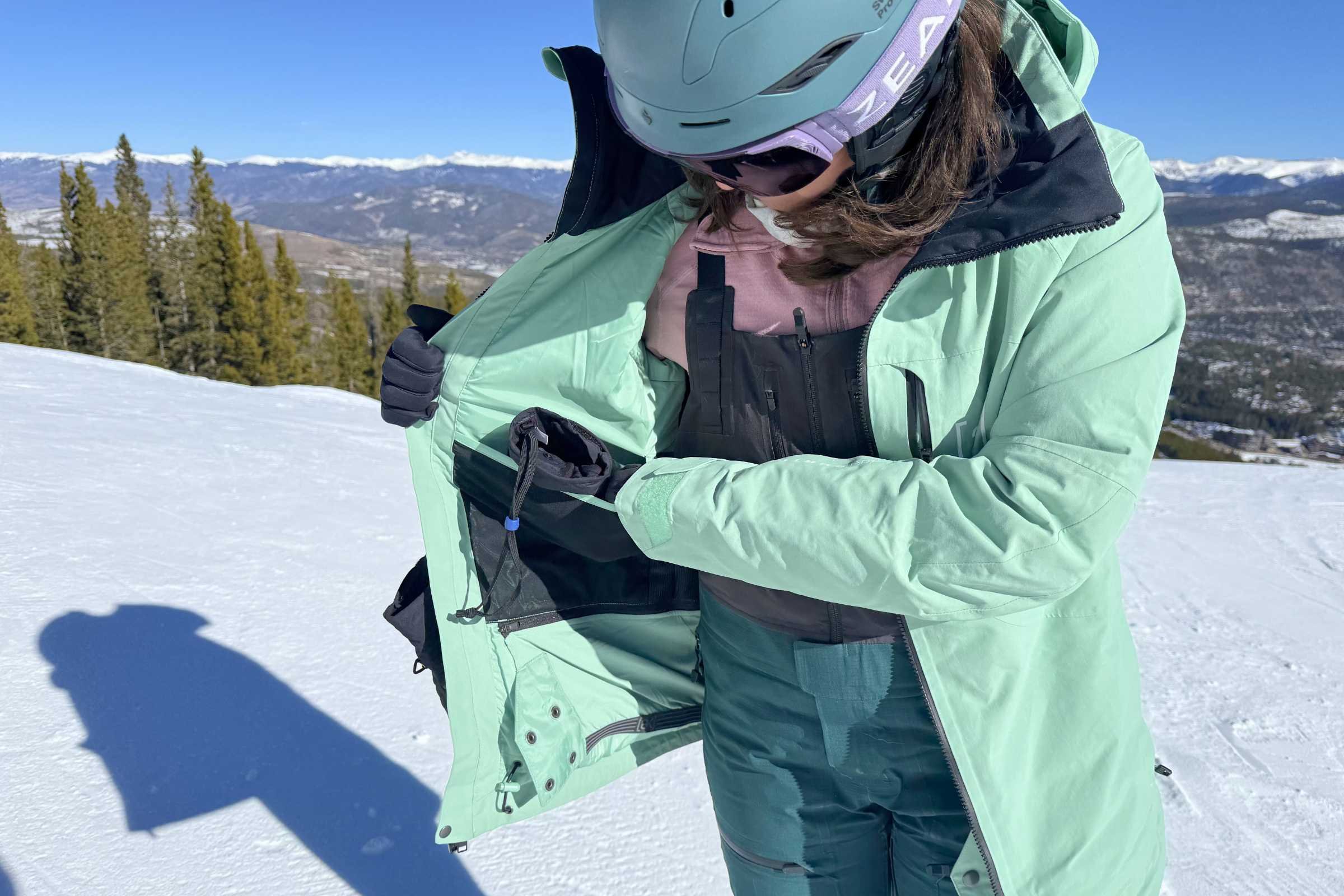 Close-up of inside and outside pockets on Burton Embark Insulated snowboard jacket