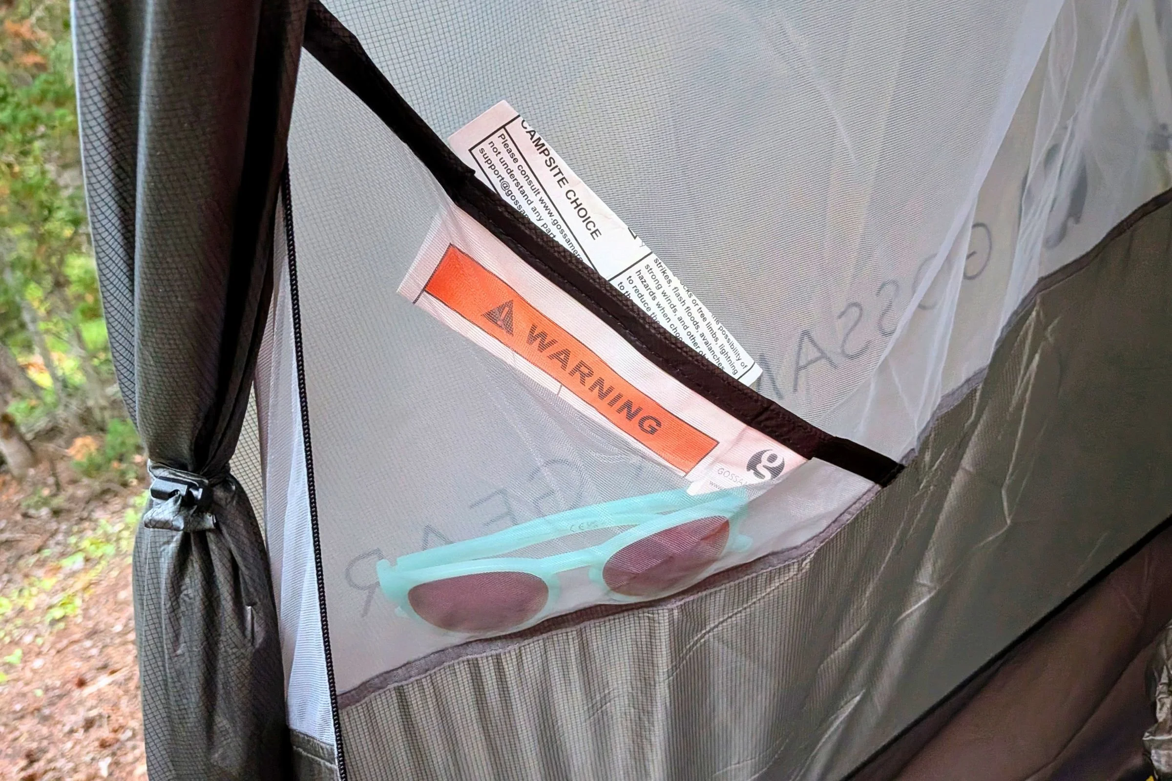 An interior mesh pocket holds sunglasses inside Gossamer Gear The Free.