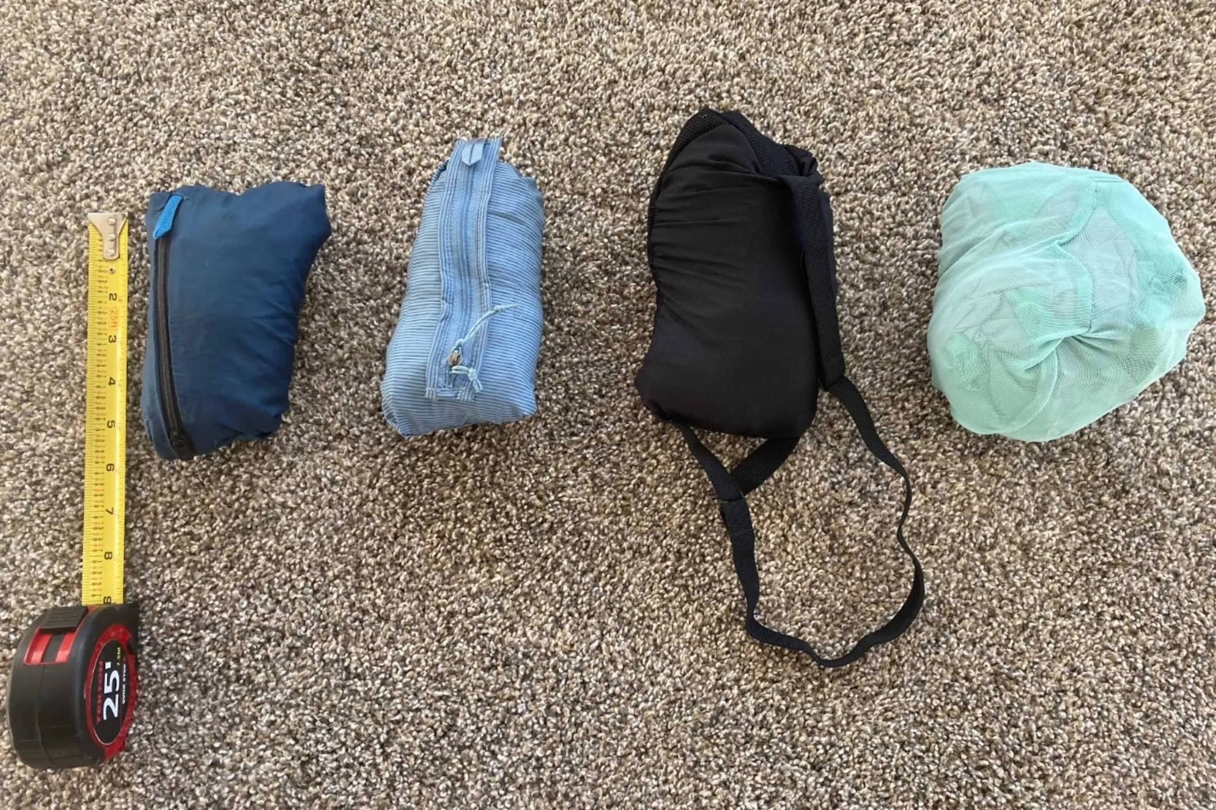 Black Diamond Distance > Patagonia Houdini Air > Brooks Canopy > The North Face Futurelight packed into pockets found on the jacket  Photo by Trey French