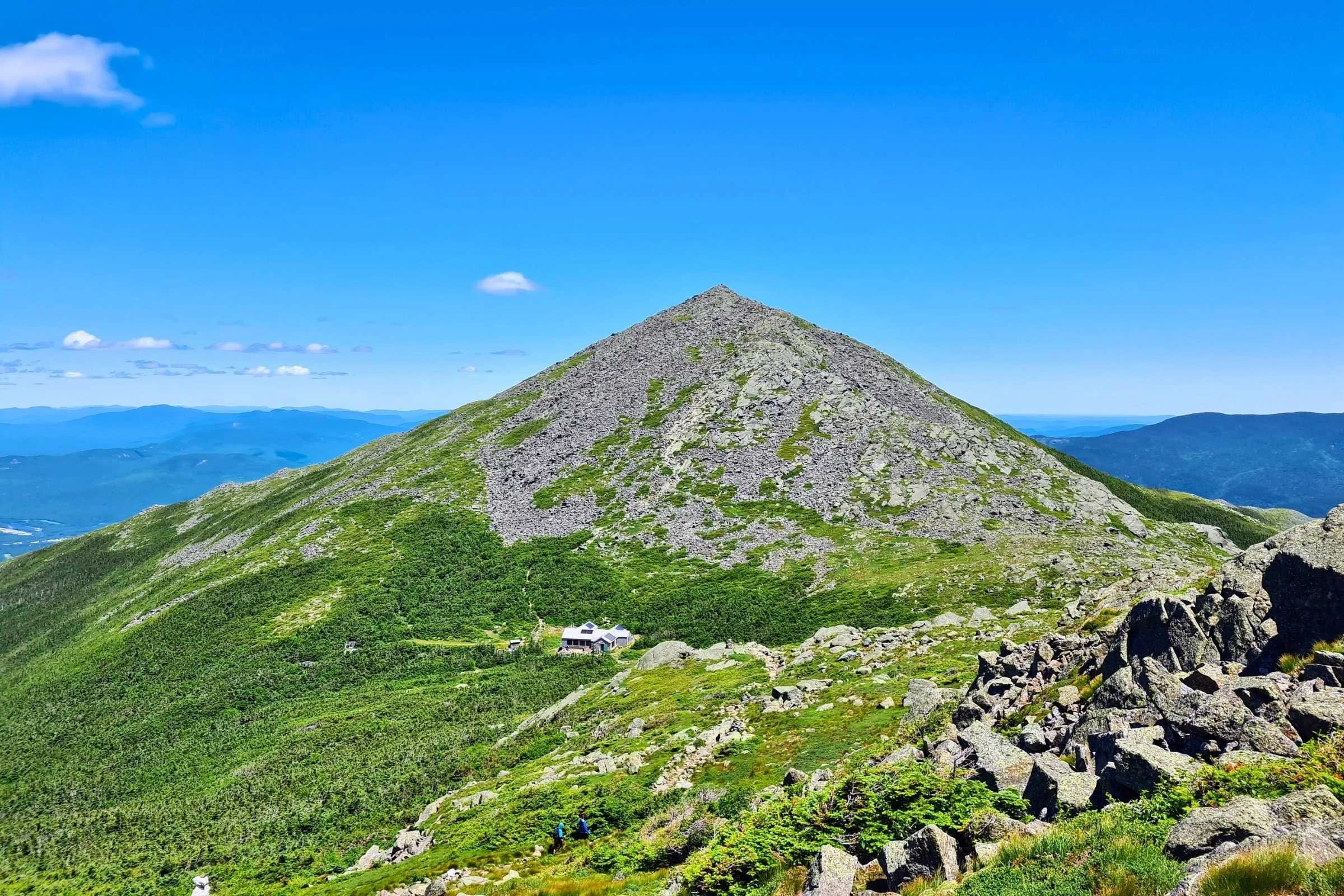Madison Spring hut in the shadow of Mt Madison, seen from the side of Mt Adams. Photo by Aubri Drake.