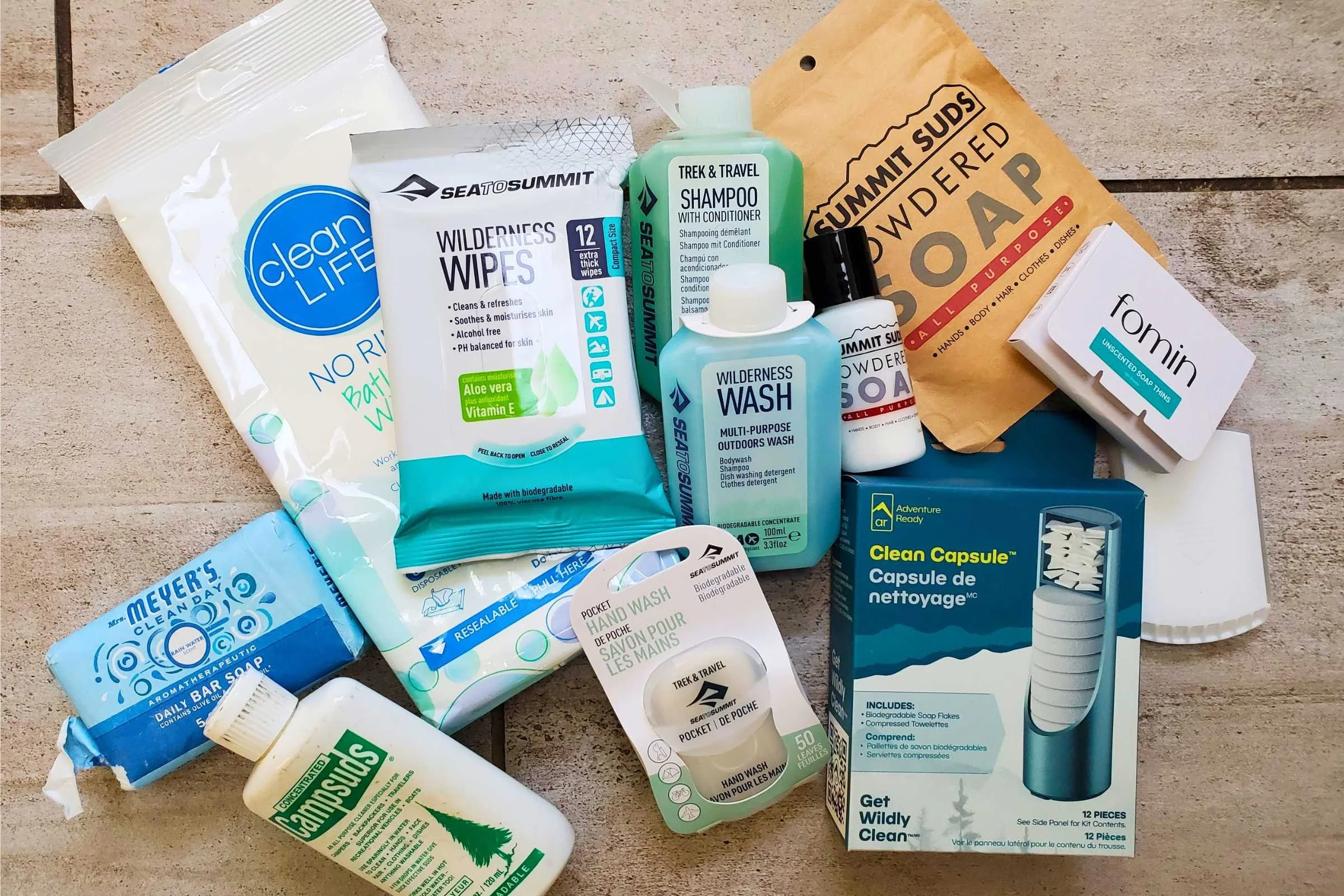 A collection of biodegradable soaps grouped on a flat surface