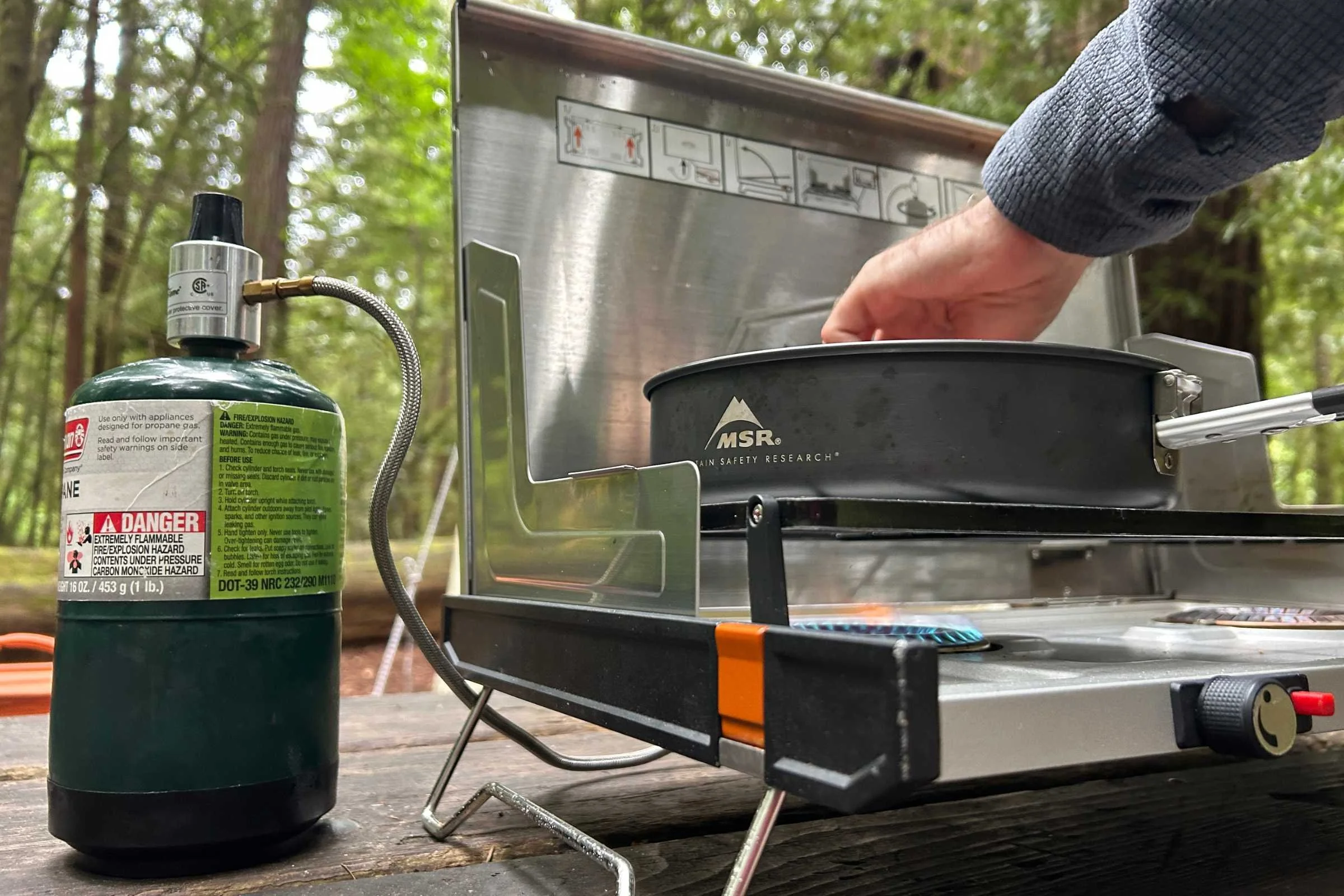 Close-up on GSI Pinnacle Pro stove's legs on camp table