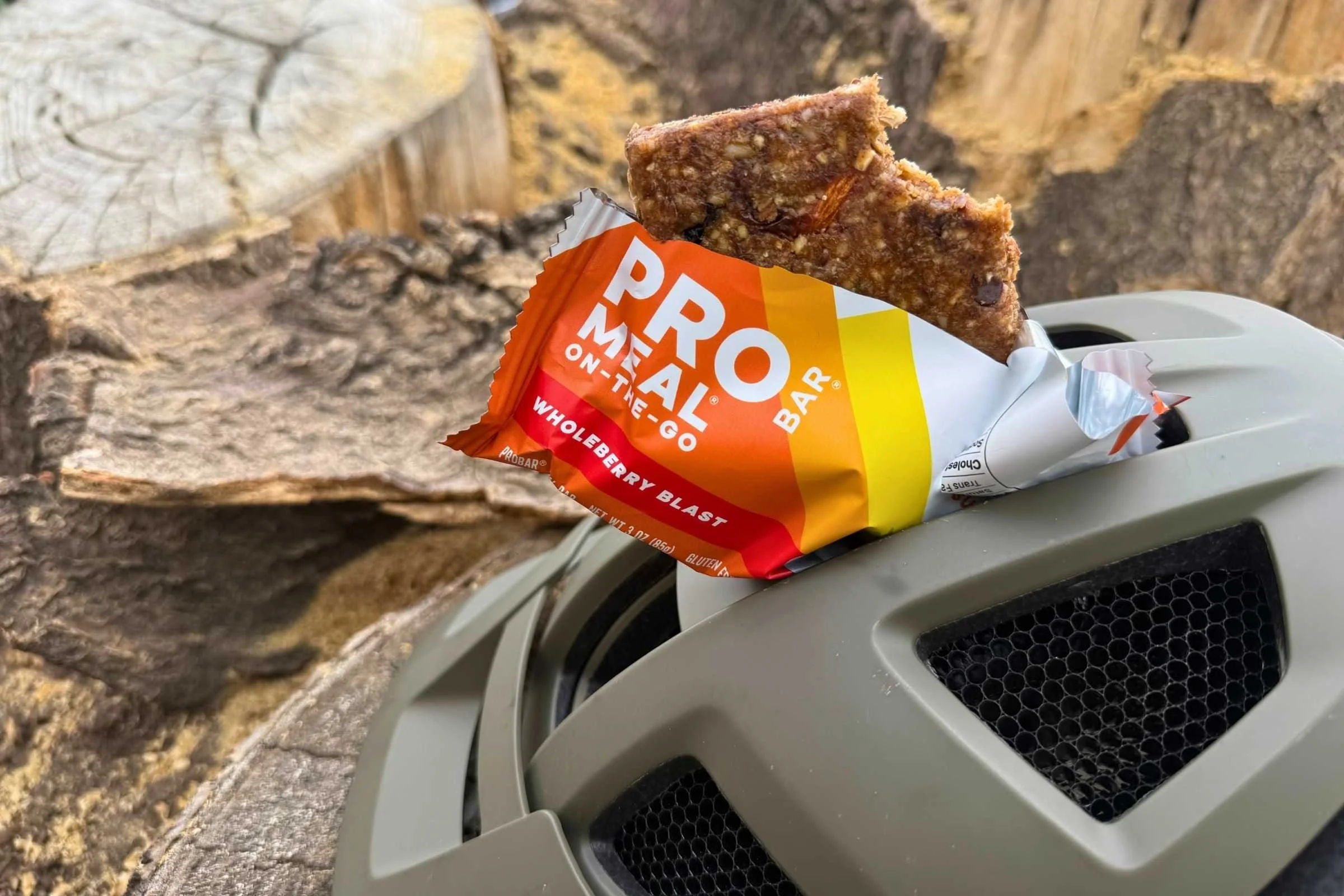 an opened ProBar sticking out of a mountain bike helmet