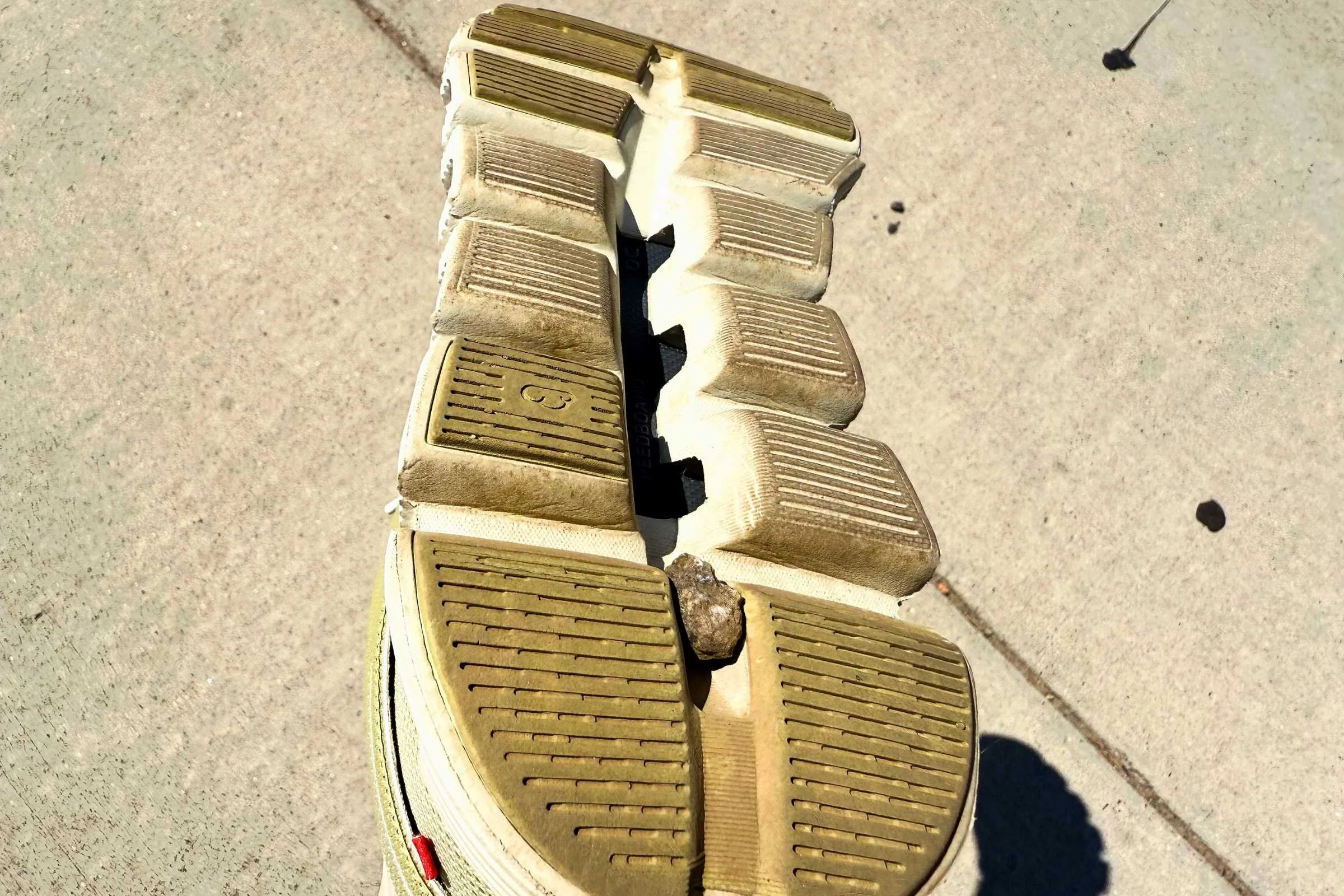 outsole of on cloud 6 with small rock stuck in it