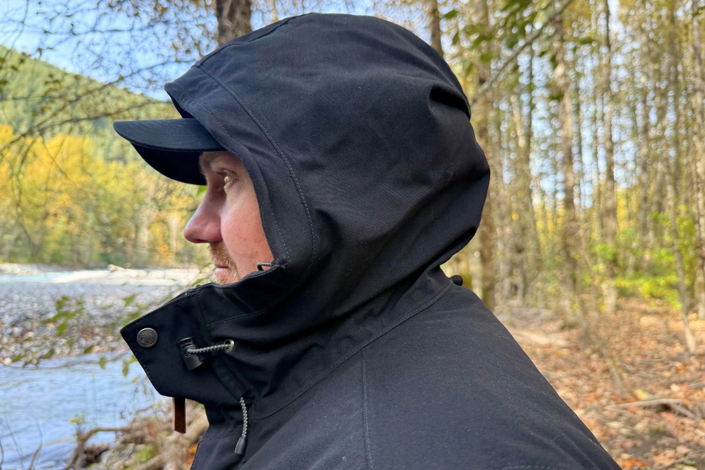 The wire brim helps the hood hold shape which helps keep rain and snow off your face.
