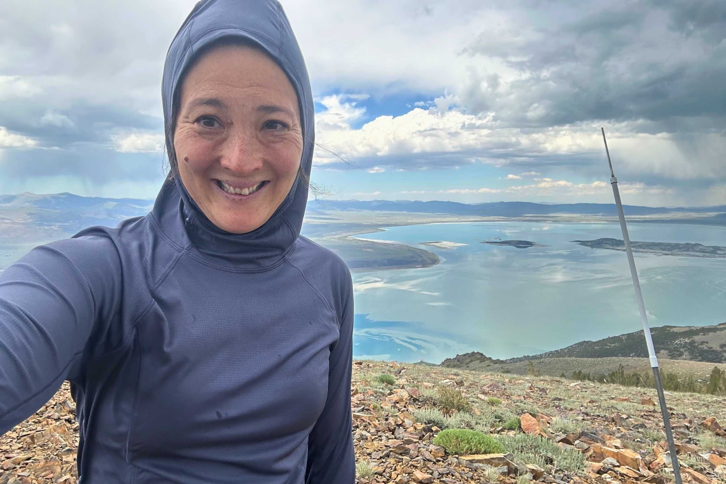 Hood coverage on the REI Flash Shade hoodie while at high altitude hike with little shade (the pointy look is because I had a pony tail and had yet to discover the pony tail hole in the back of the hood!)