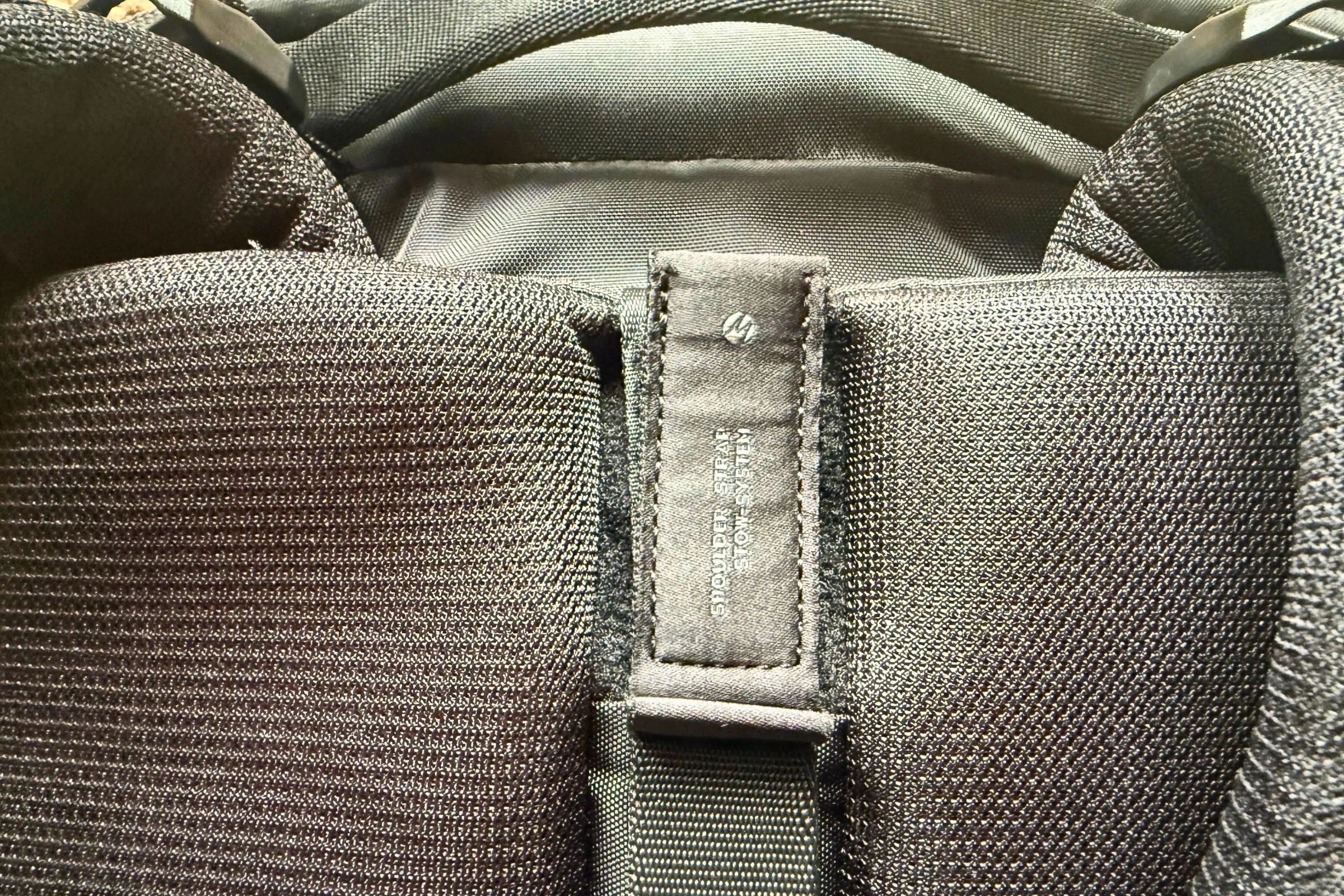 Matador 35L Global Travel Pack close up of shoulder strap adjustment