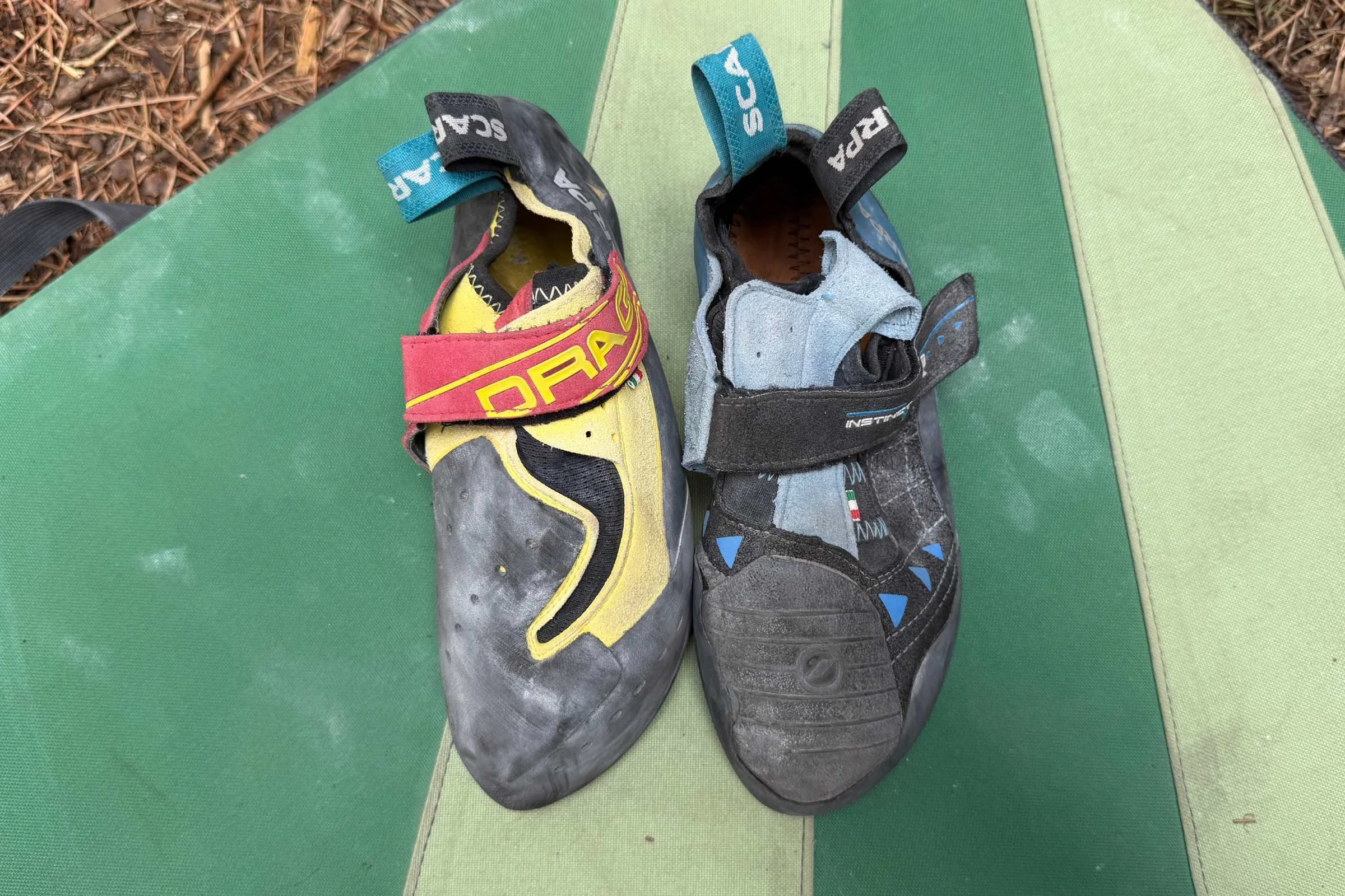 Scarpa Drago next to Scarpa Instinct VSR showcasing the difference in their size